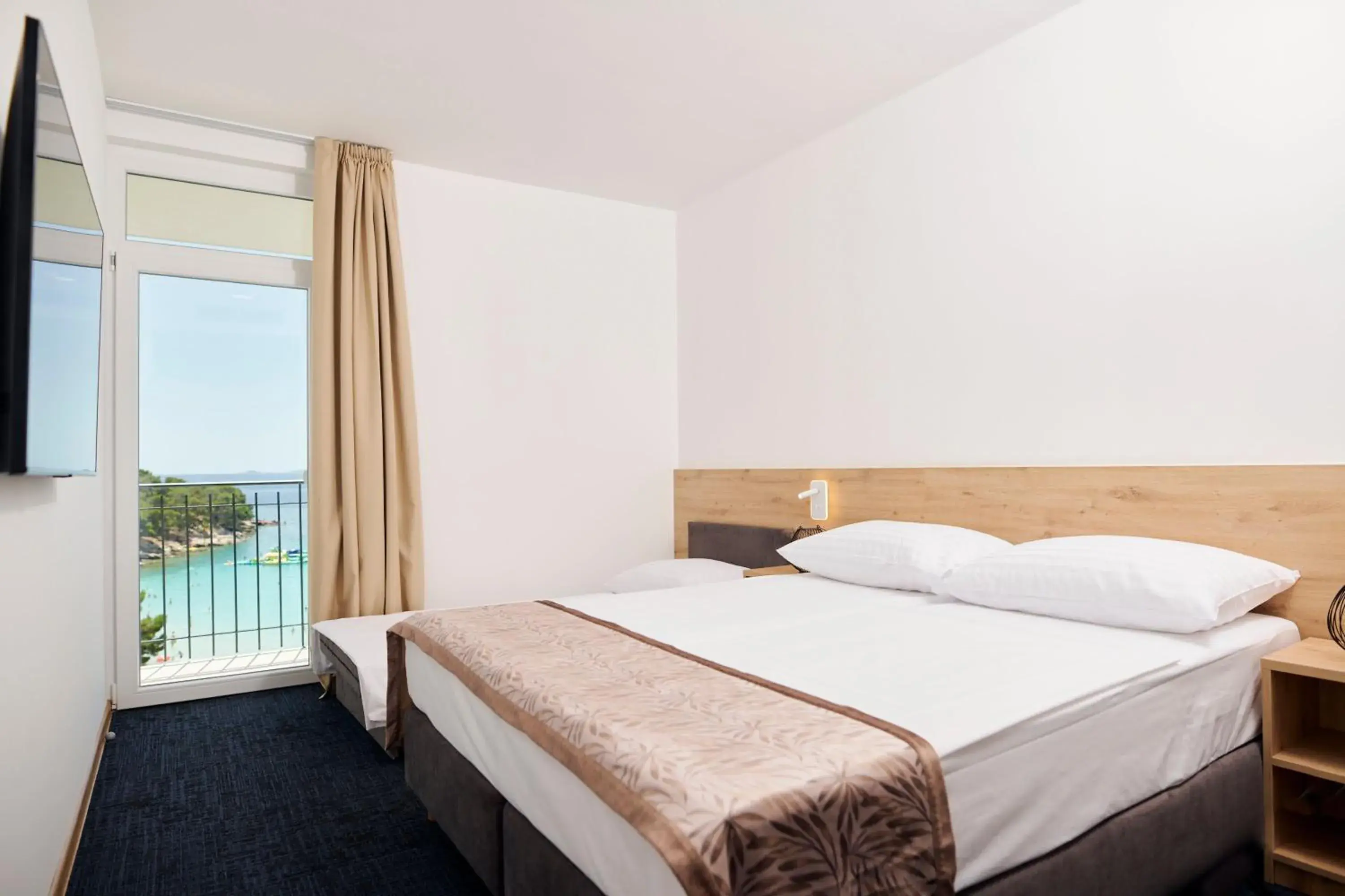 Family Room with Sea View and Balcony in Colentum Resort Murter Family Room with Sea View and Balcony in Colentum Resort Murter