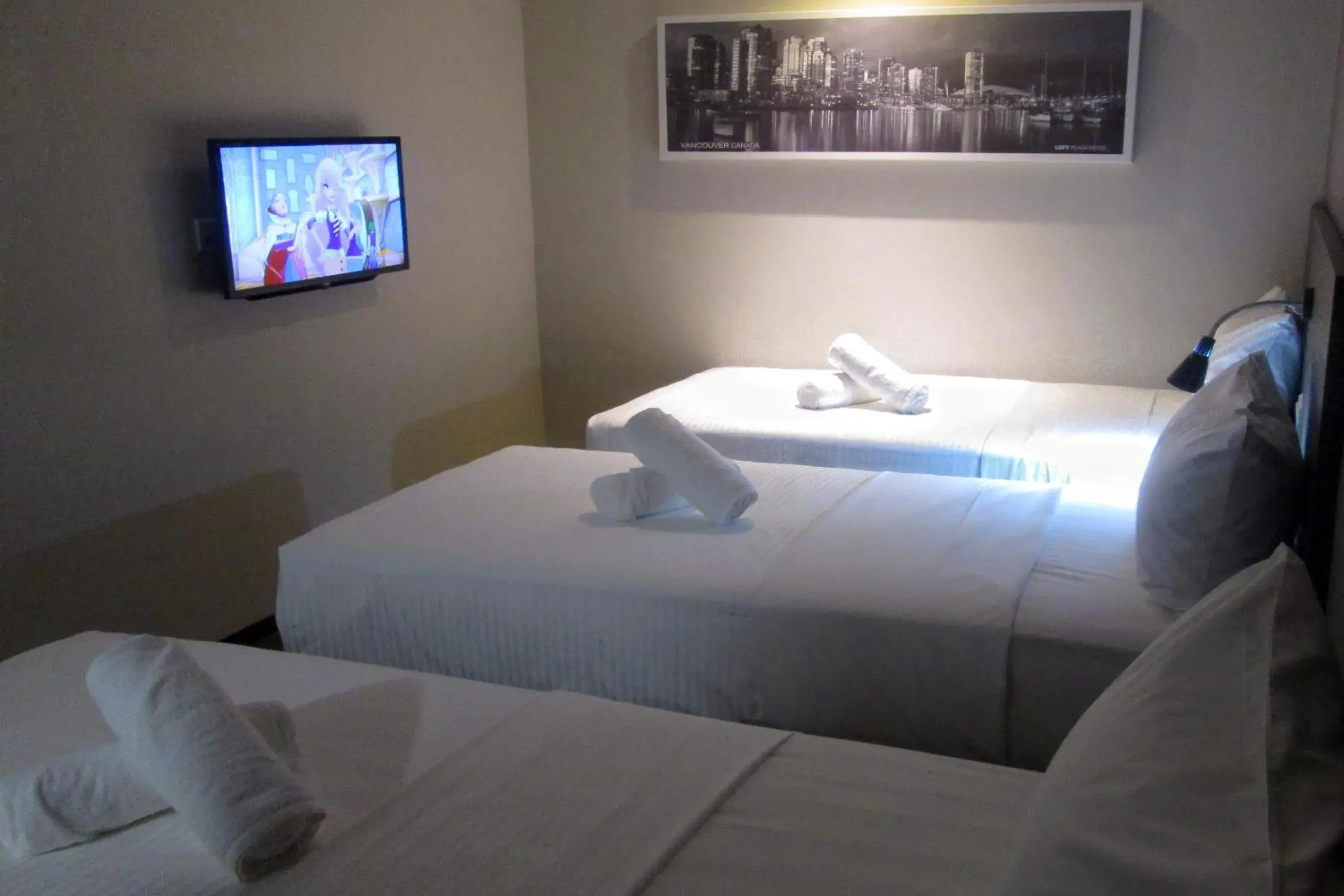 Deluxe Room in The Loft Plaza Hotel Deluxe Room in The Loft Plaza Hotel