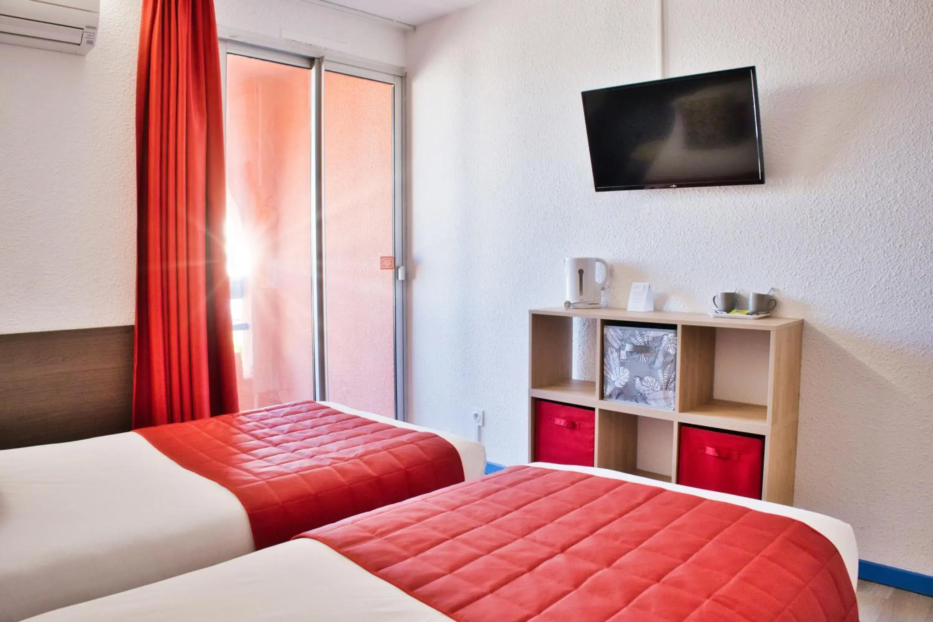 Twin Room with Village View - single occupancy in Cit'Hotel des 2 Golfs Twin Room with Village View - single occupancy in Cit'Hotel des 2 Golfs