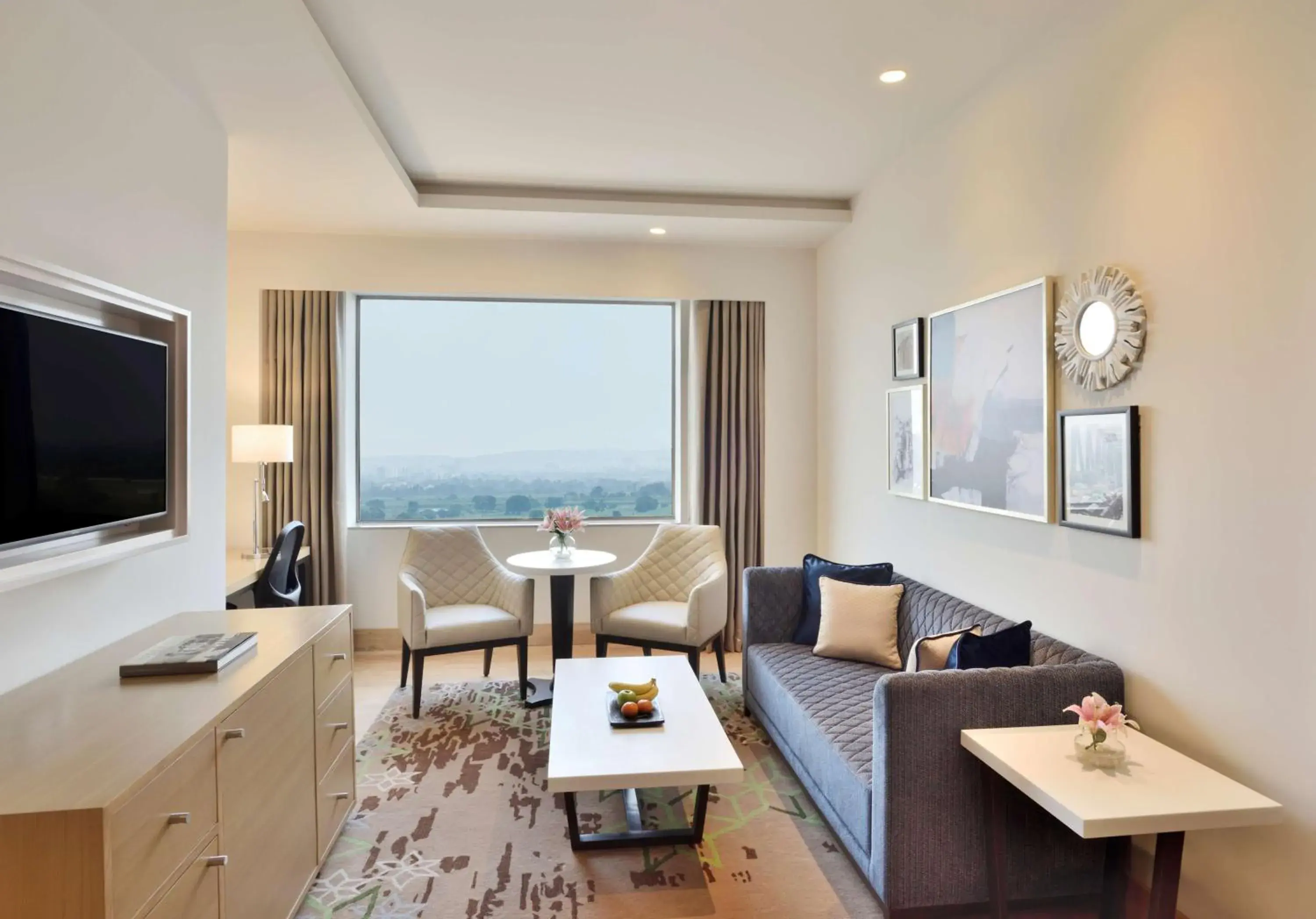 Executive Suite with 20% Discount on Food & Beverages, Complimentary 2 Soft drinks at BAR, 20% Discount on SPA, Early Check-in by 11 AM & Late check-out by 3 PM (Subject to availability), Two Way Airport Transfers & 4 Pieces Laundry in Radisson Gurugram Udyog Vihar Executive Suite with 20% Discount on Food & Beverages, Complimentary 2 Soft drinks at BAR, 20% Discount on SPA, Early Check-in by 11 AM & Late check-out by 3 PM (Subject to availability), Two Way Airport Transfers & 4 Pieces Laundry in Radisson Gurugram Udyog Vihar