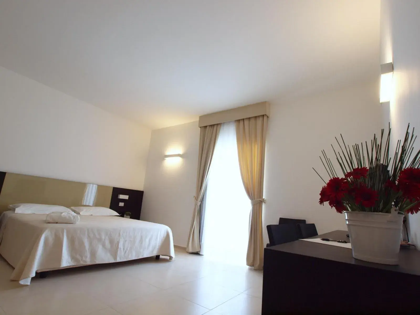 Quadruple Room in Hotel Villa San Bartolo Quadruple Room in Hotel Villa San Bartolo