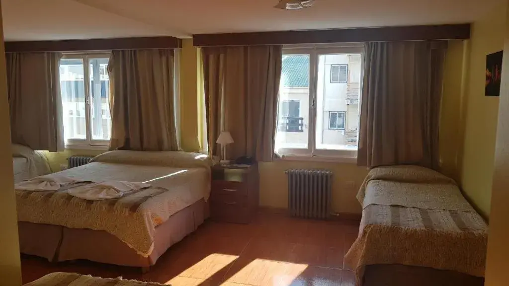 Quadruple Room with Bathroom in Monte Cervino Hotel Quadruple Room with Bathroom in Monte Cervino Hotel