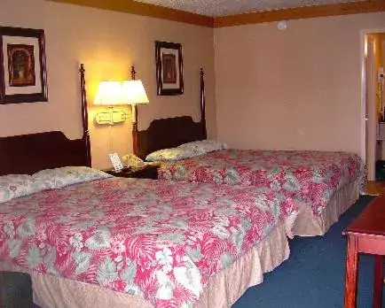 Queen Room with Two Queen Beds in Executive Inn and Suites Springdale Queen Room with Two Queen Beds in Executive Inn and Suites Springdale