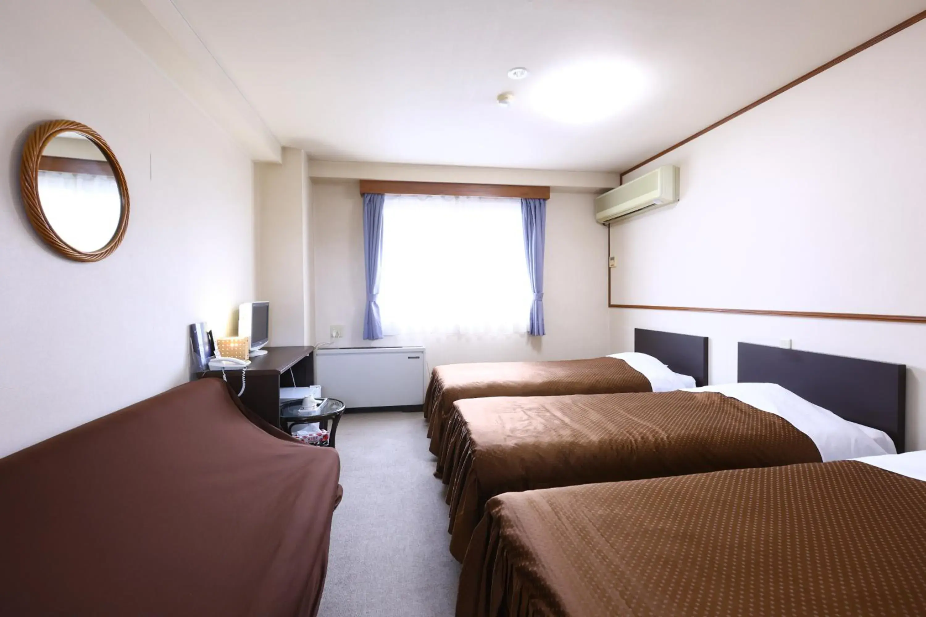 Economy Triple Room in Hotel Sunplaza Tsugaike Economy Triple Room in Hotel Sunplaza Tsugaike
