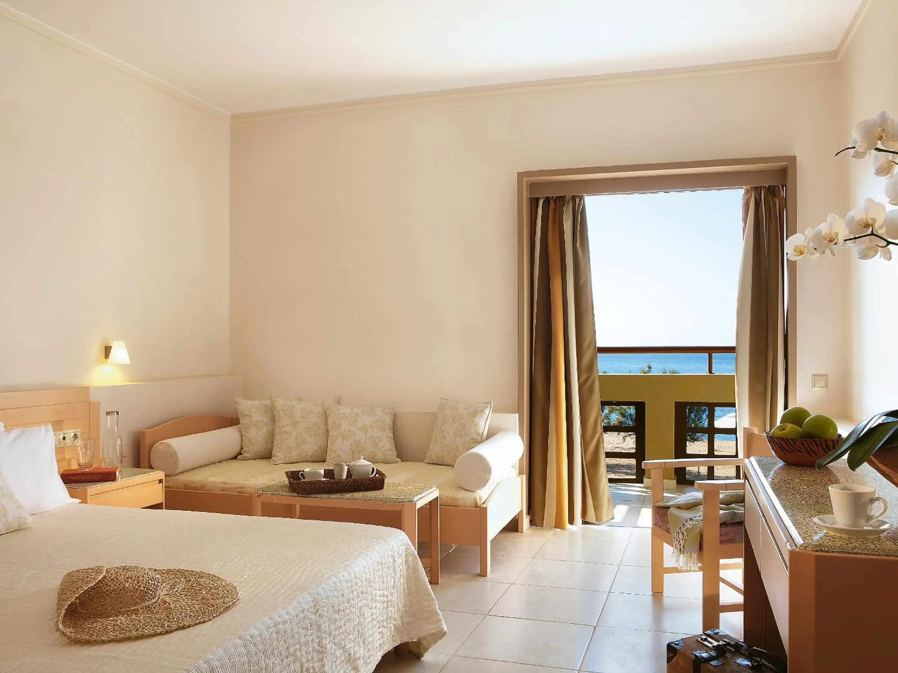 Triple Room with Garden View in Grecotel Meli Palace Triple Room with Garden View in Grecotel Meli Palace