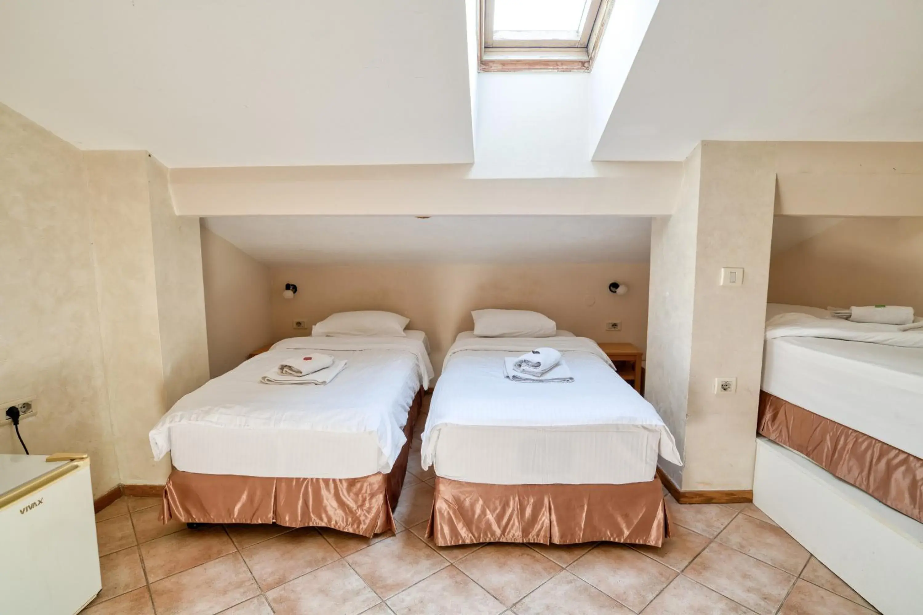 Triple Room with Rooftop Window (4th floor) in Hotel Rendez Vous Triple Room with Rooftop Window (4th floor) in Hotel Rendez Vous