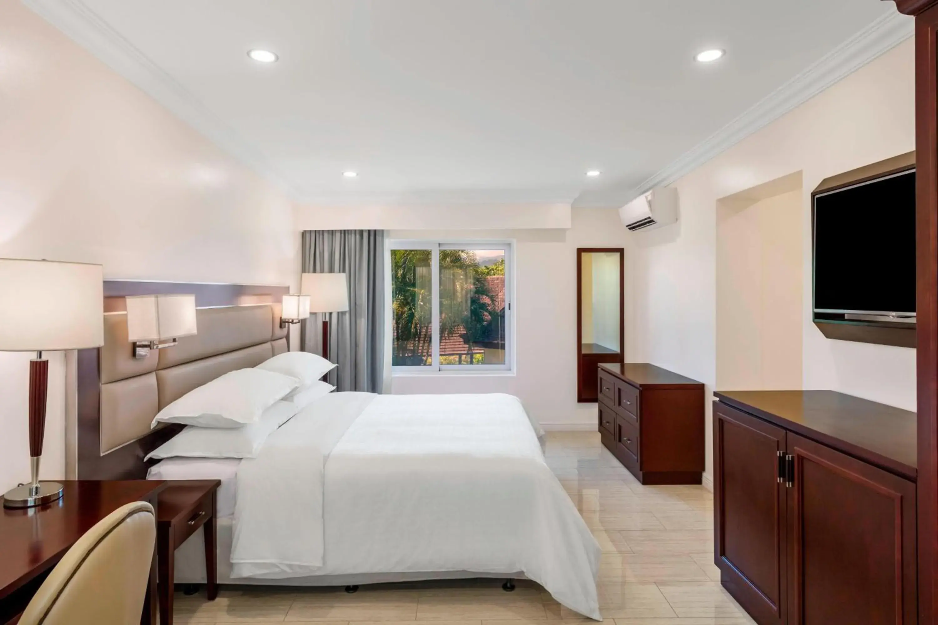 Two-Bedroom Family Room with Two King Beds in Sheraton Samoa Aggie Grey's Hotel & Bungalows Two-Bedroom Family Room with Two King Beds in Sheraton Samoa Aggie Grey's Hotel & Bungalows