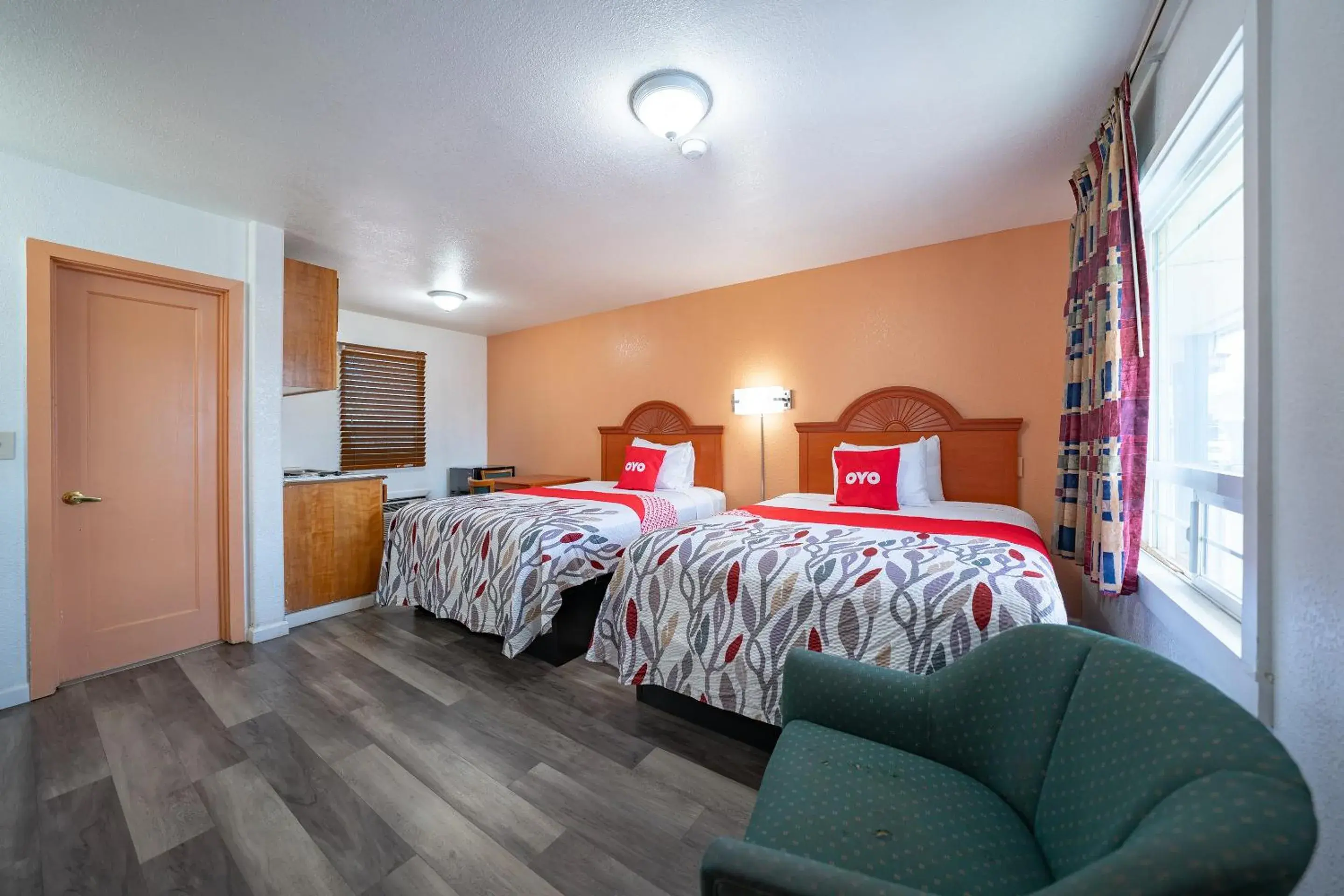 Premium 2 Queen Bed with Kitchenette in Budget Inn Madras by OYO Premium 2 Queen Bed with Kitchenette in Budget Inn Madras by OYO