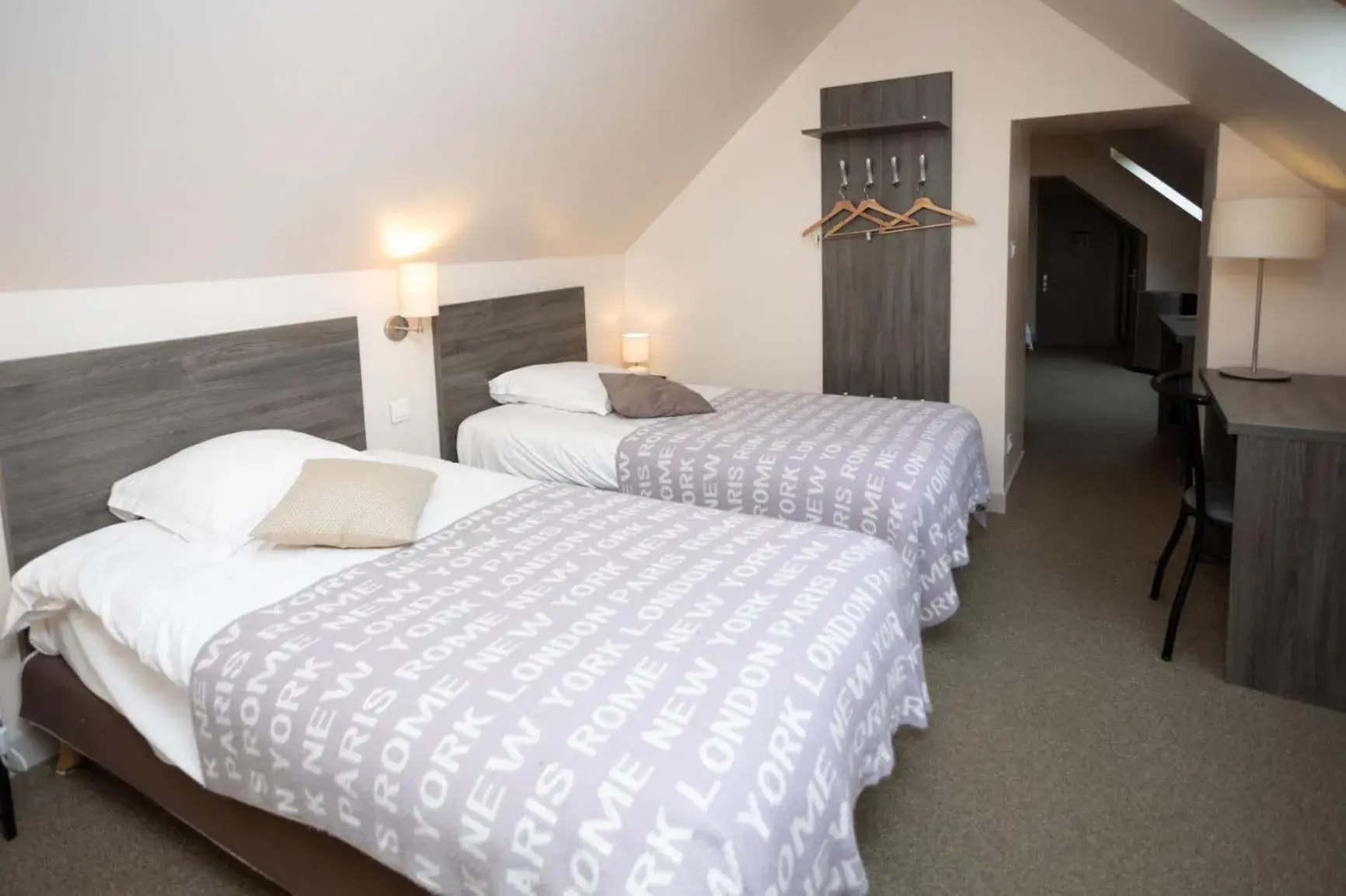 Family Room (2 Adults + 2 Children) in Logis-Hôtel & Restaurant LE CARNOT Family Room (2 Adults + 2 Children) in Logis-Hôtel & Restaurant LE CARNOT