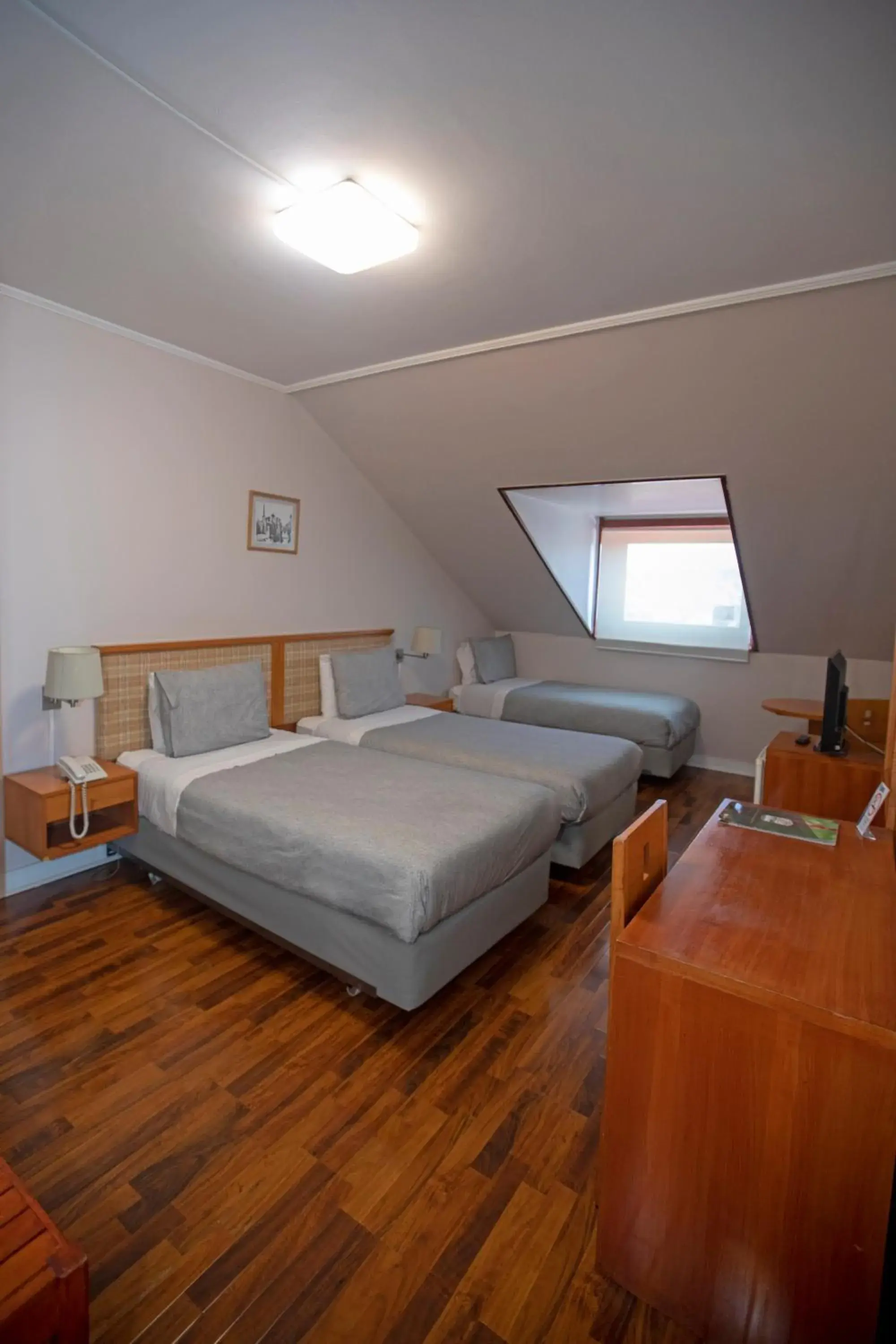 Standard Triple Room in Nobile Suites Vicente Costanera Standard Triple Room in Nobile Suites Vicente Costanera