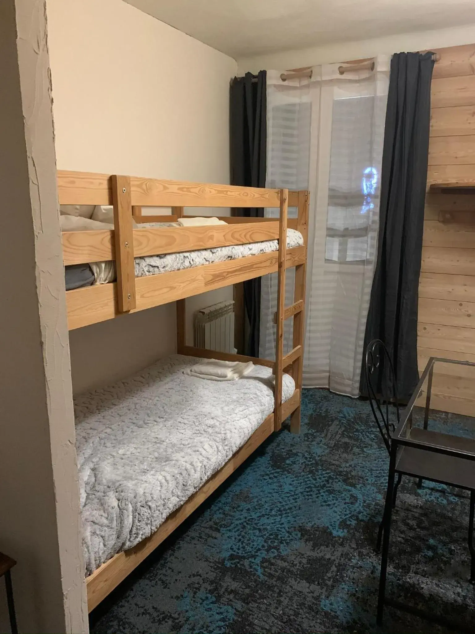 Quadruple Room with Balcony in Hôtel l'Équipe Quadruple Room with Balcony in Hôtel l'Équipe