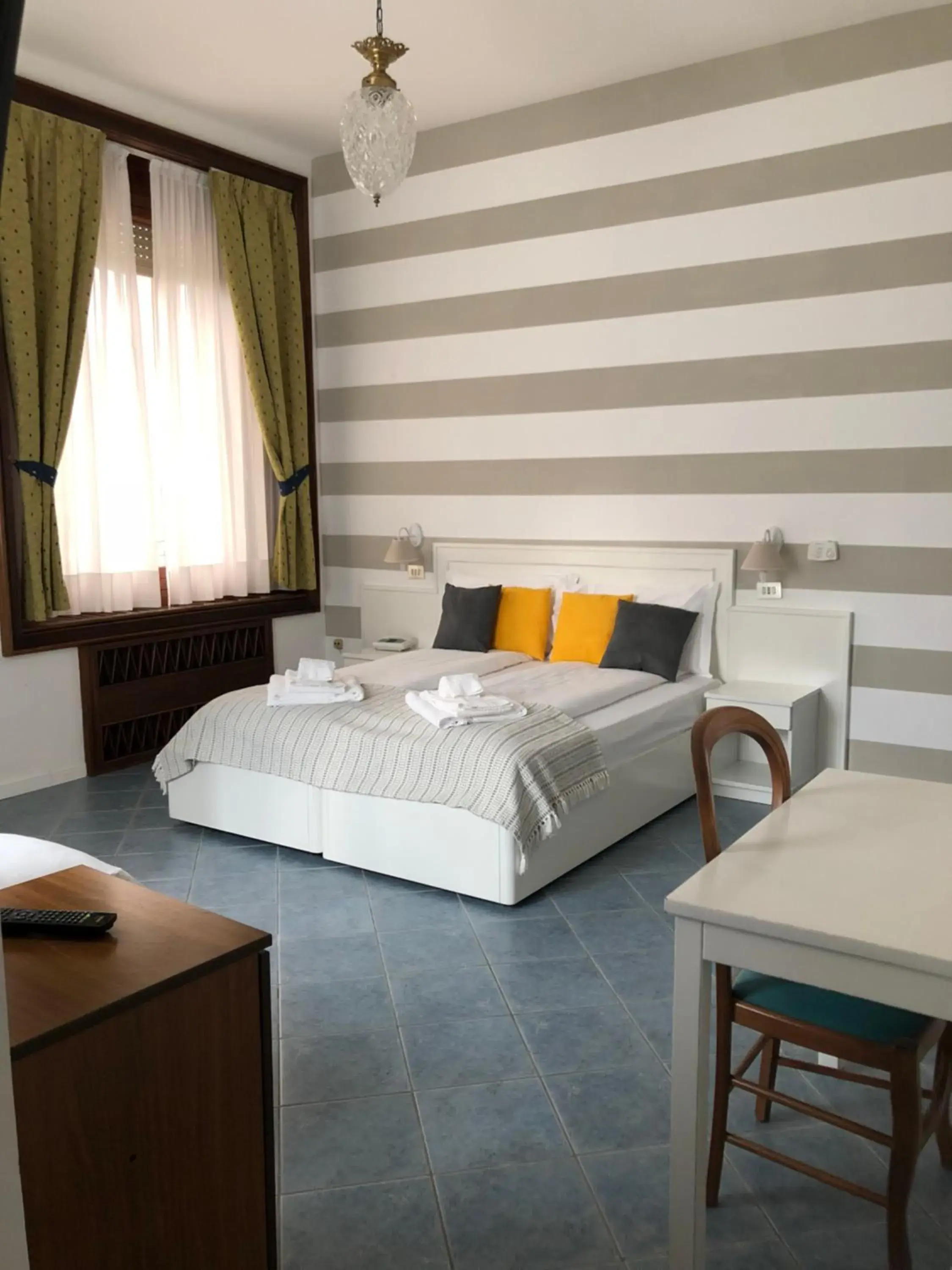 Triple Room with Garden View in Hotel La Fontana Triple Room with Garden View in Hotel La Fontana