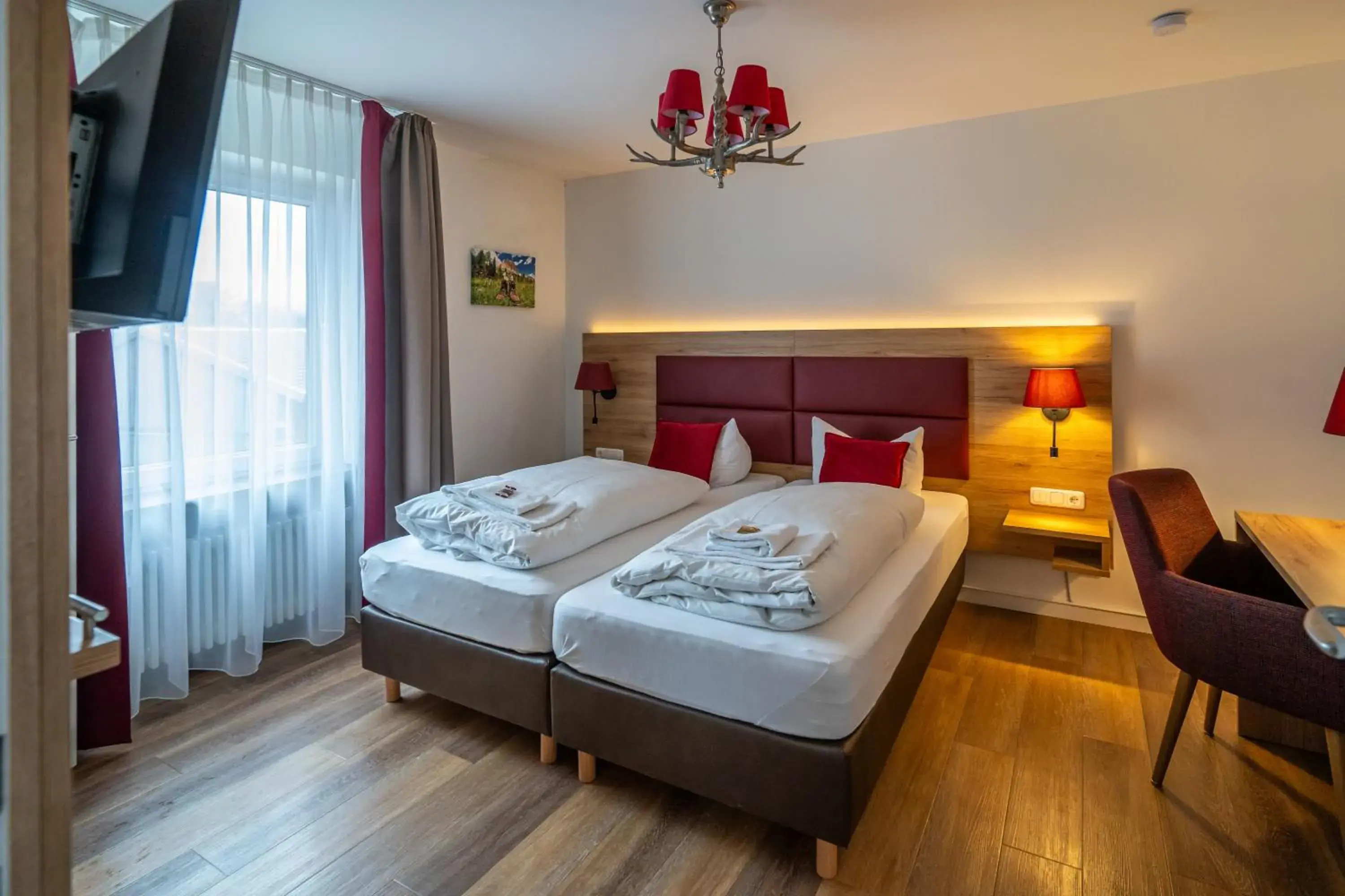 Classic Triple Room - single occupancy in Hotel Weißbräu Classic Triple Room - single occupancy in Hotel Weißbräu