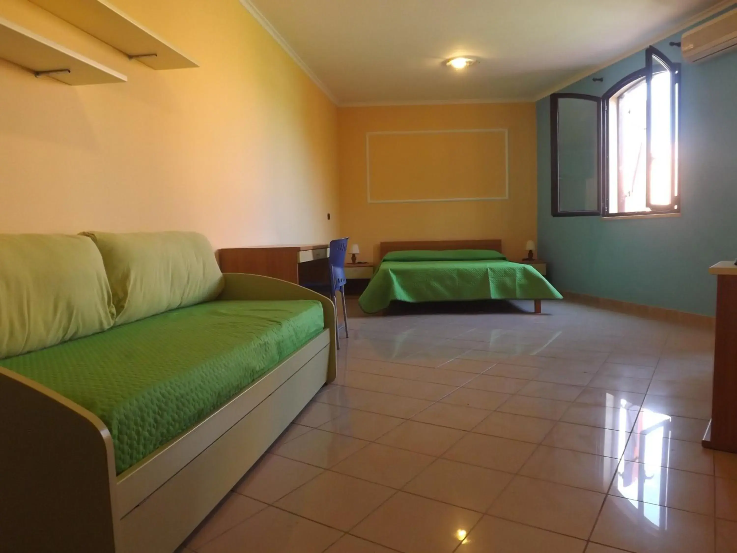 Triple Room with Garden View in Hotel Ristorante Al Canto delle Sirene Triple Room with Garden View in Hotel Ristorante Al Canto delle Sirene