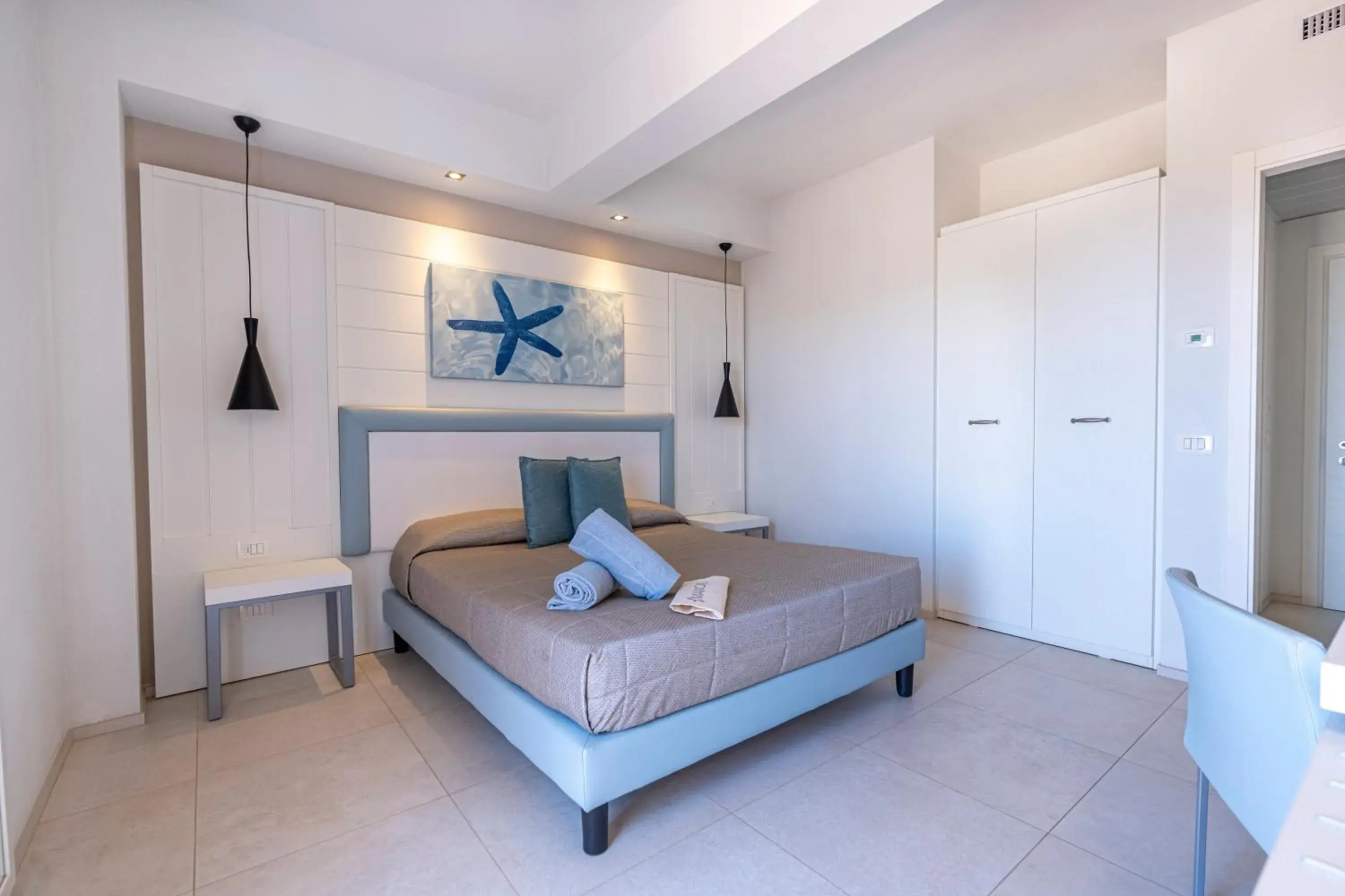 Superior Triple Room with Sea View in Mangia's Pollina Resort Superior Triple Room with Sea View in Mangia's Pollina Resort