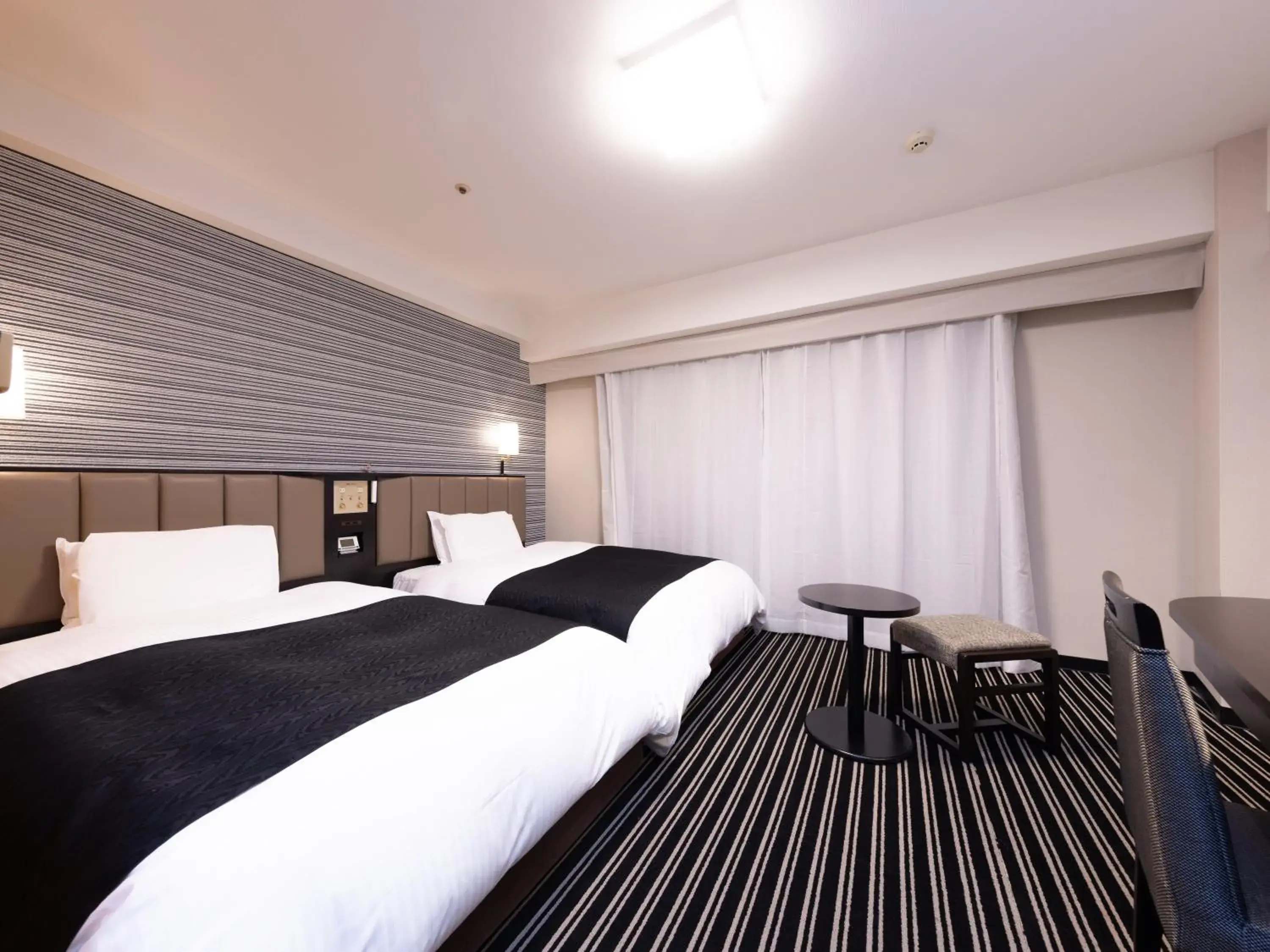 Twin Room - single occupancy - Non-Smoking in APA Hotel Fukuoka Watanabedori Ekimae EXCELLENT Twin Room - single occupancy - Non-Smoking in APA Hotel Fukuoka Watanabedori Ekimae EXCELLENT