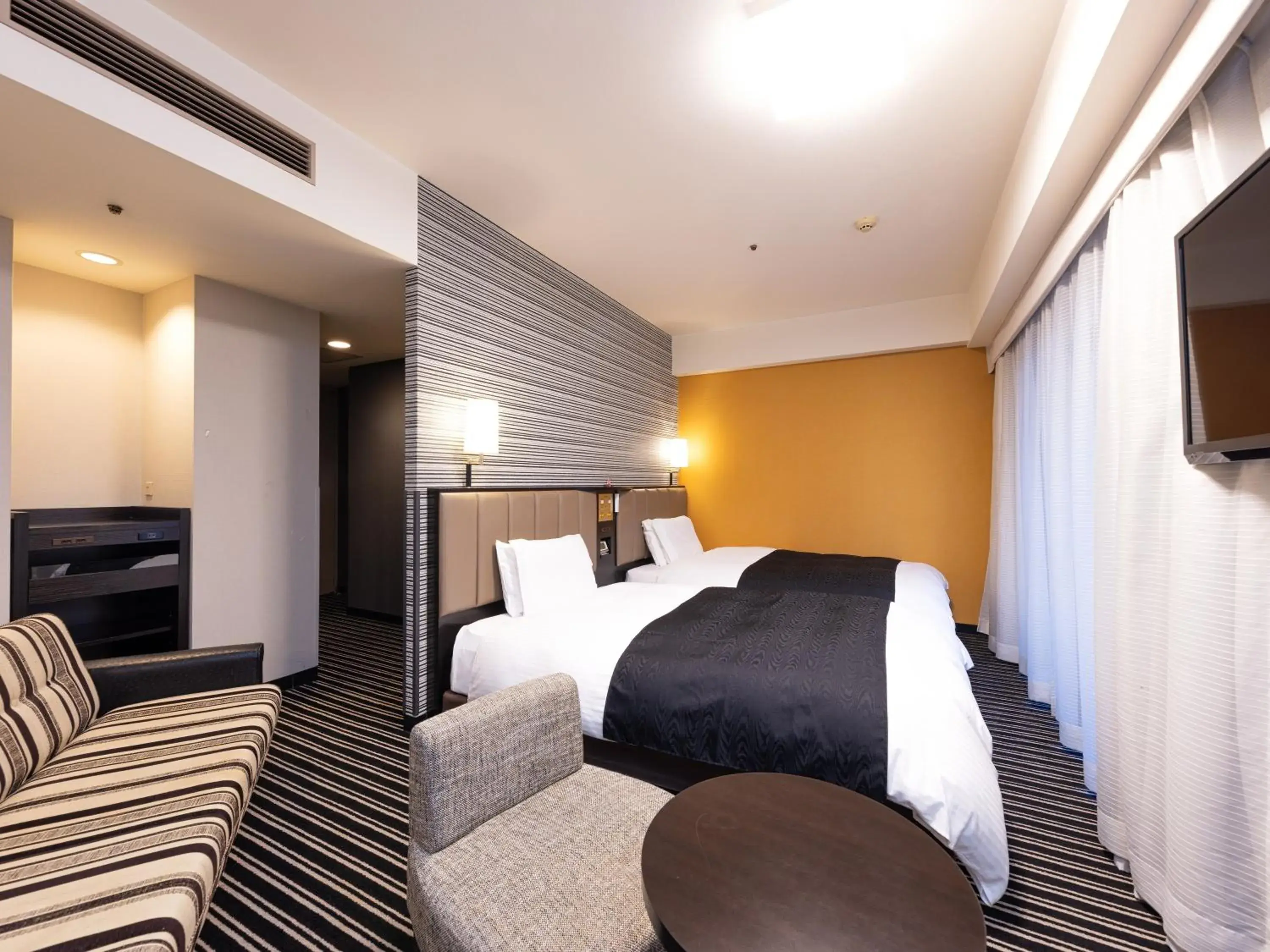 Standard Twin Room with Sofa Bed - Non-Smoking in APA Hotel Fukuoka Watanabedori Ekimae EXCELLENT Standard Twin Room with Sofa Bed - Non-Smoking in APA Hotel Fukuoka Watanabedori Ekimae EXCELLENT