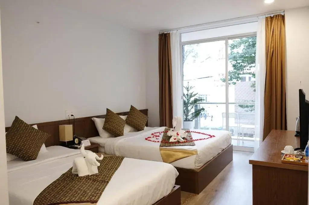 Triple Room with City View in The Umi Hotel Triple Room with City View in The Umi Hotel