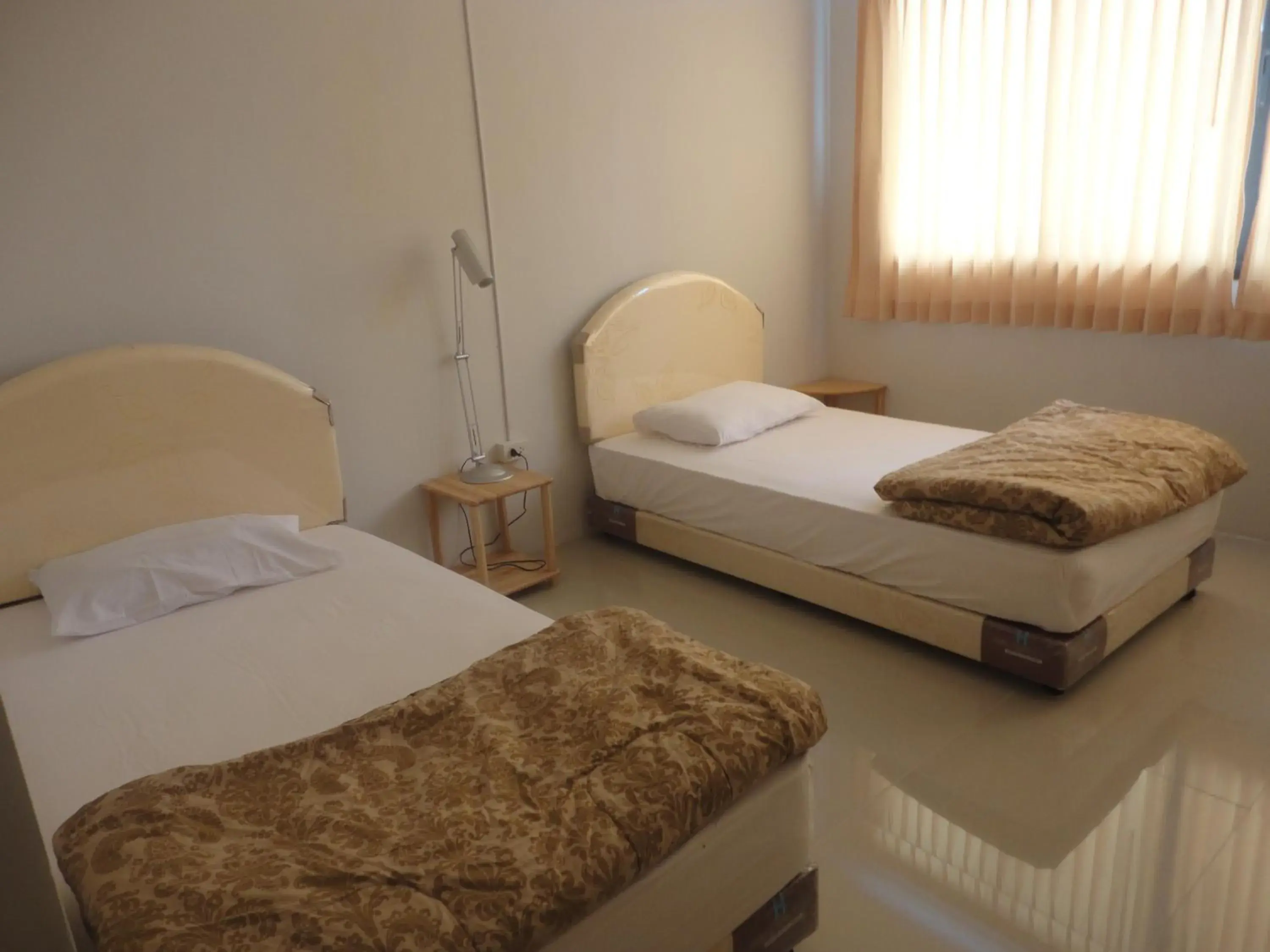 Standard Twin Room in Pupha Mansion Standard Twin Room in Pupha Mansion