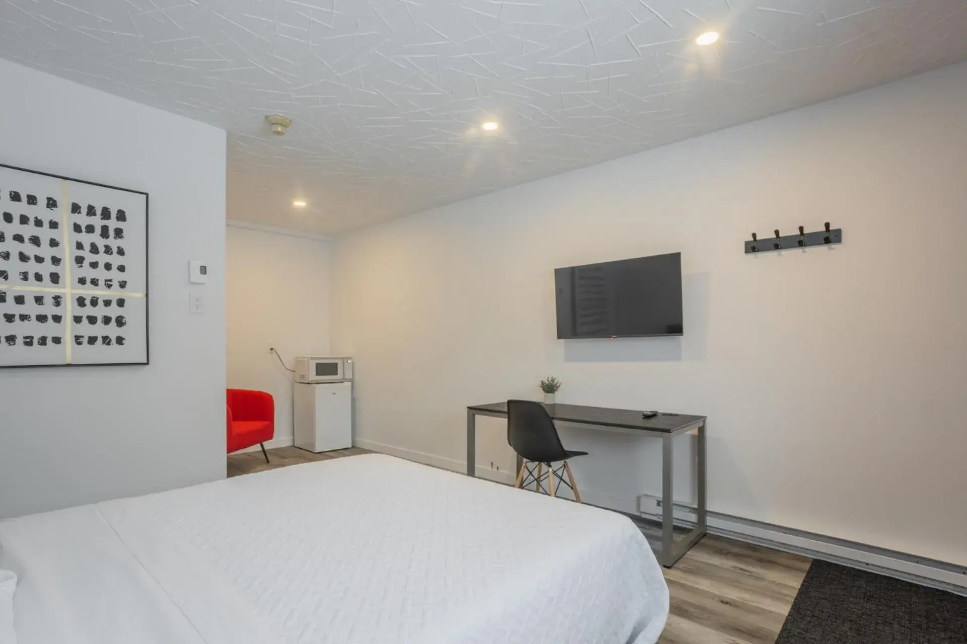 Queen Room in Motel Champlain Queen Room in Motel Champlain