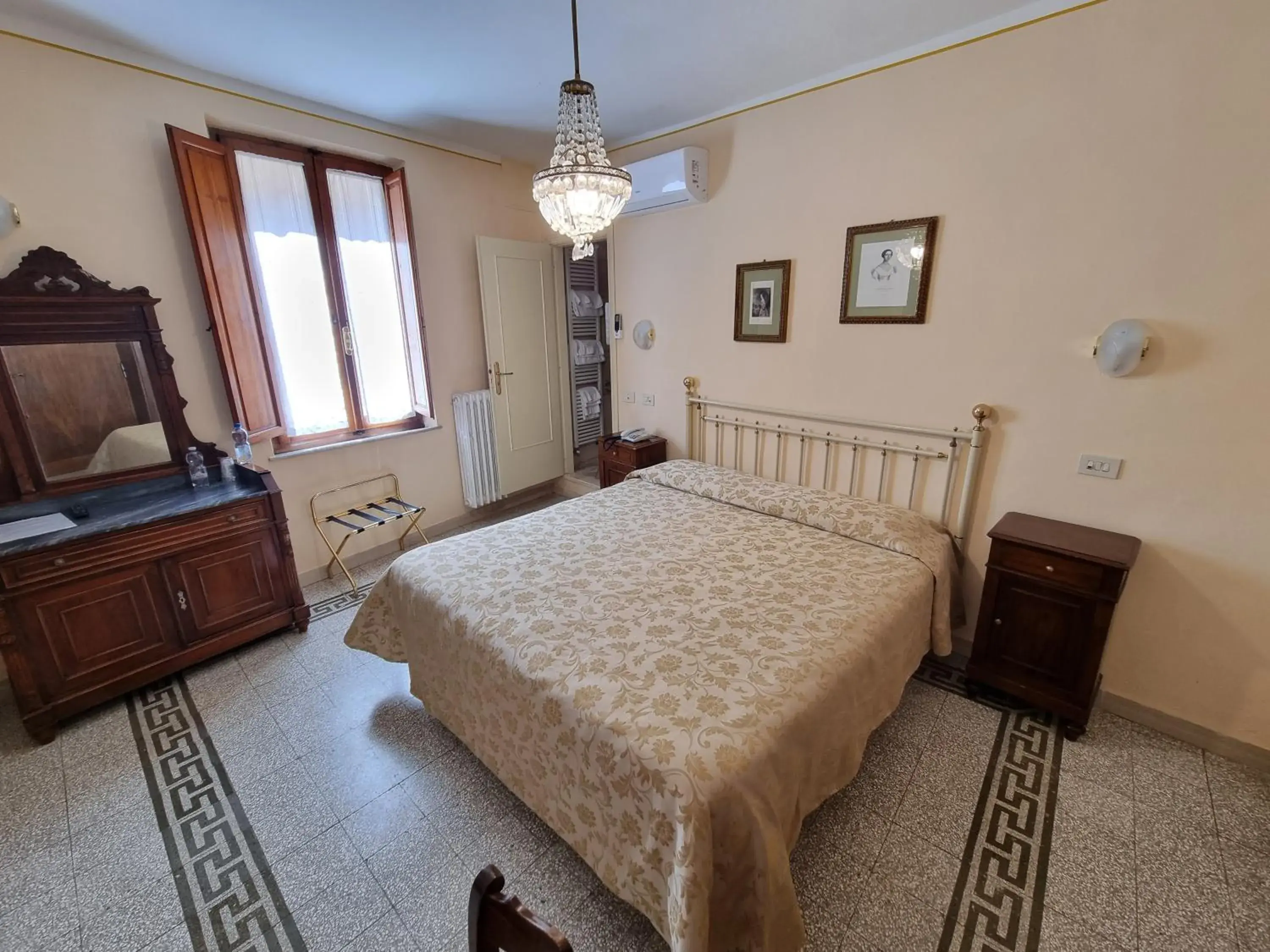 Classic Triple Room in Albergo Il Marzocco - Hotel dal 1860 Classic Triple Room in Albergo Il Marzocco - Hotel dal 1860