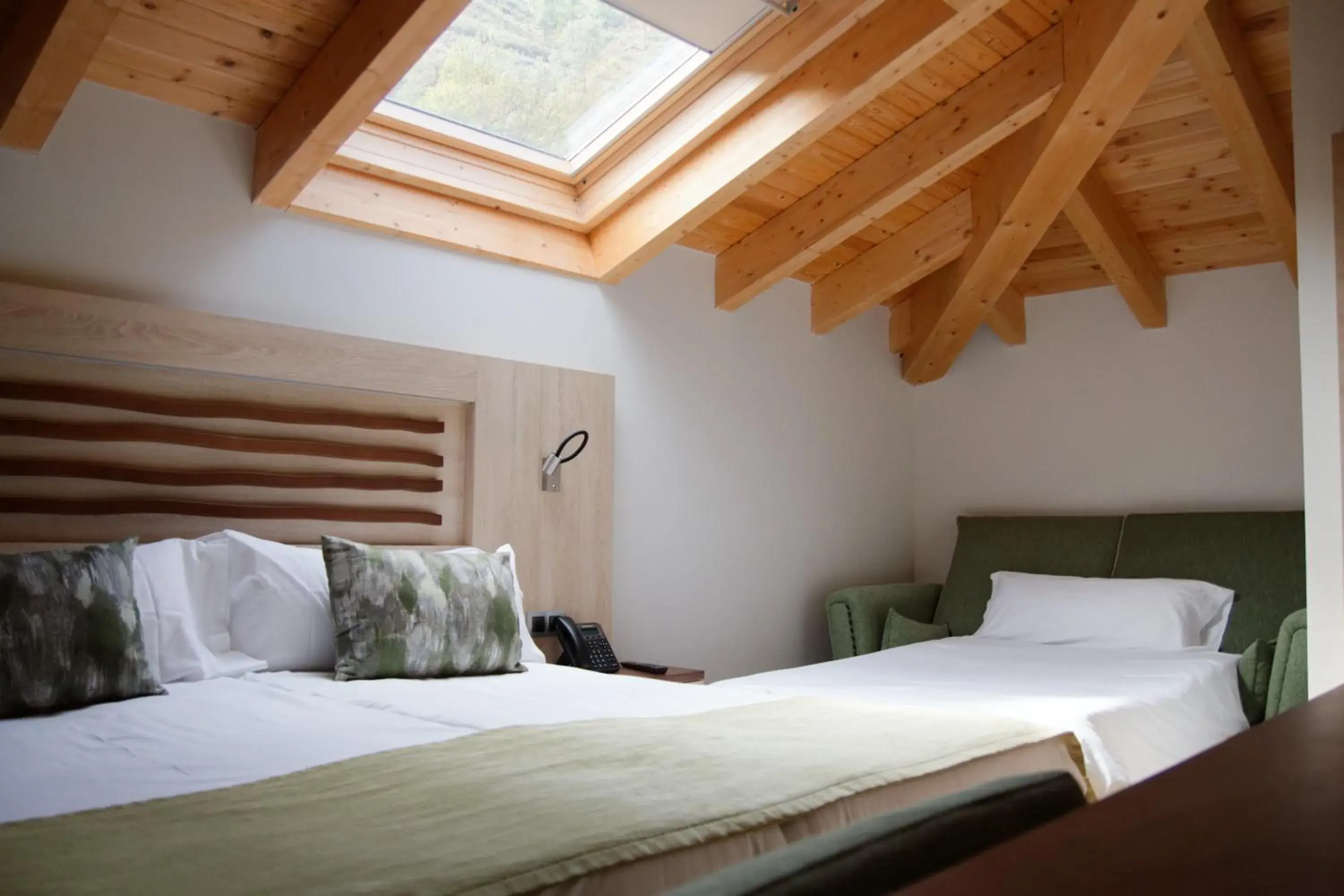 Triple Room in Hotel Rural Las Montañas de Pumar Triple Room in Hotel Rural Las Montañas de Pumar