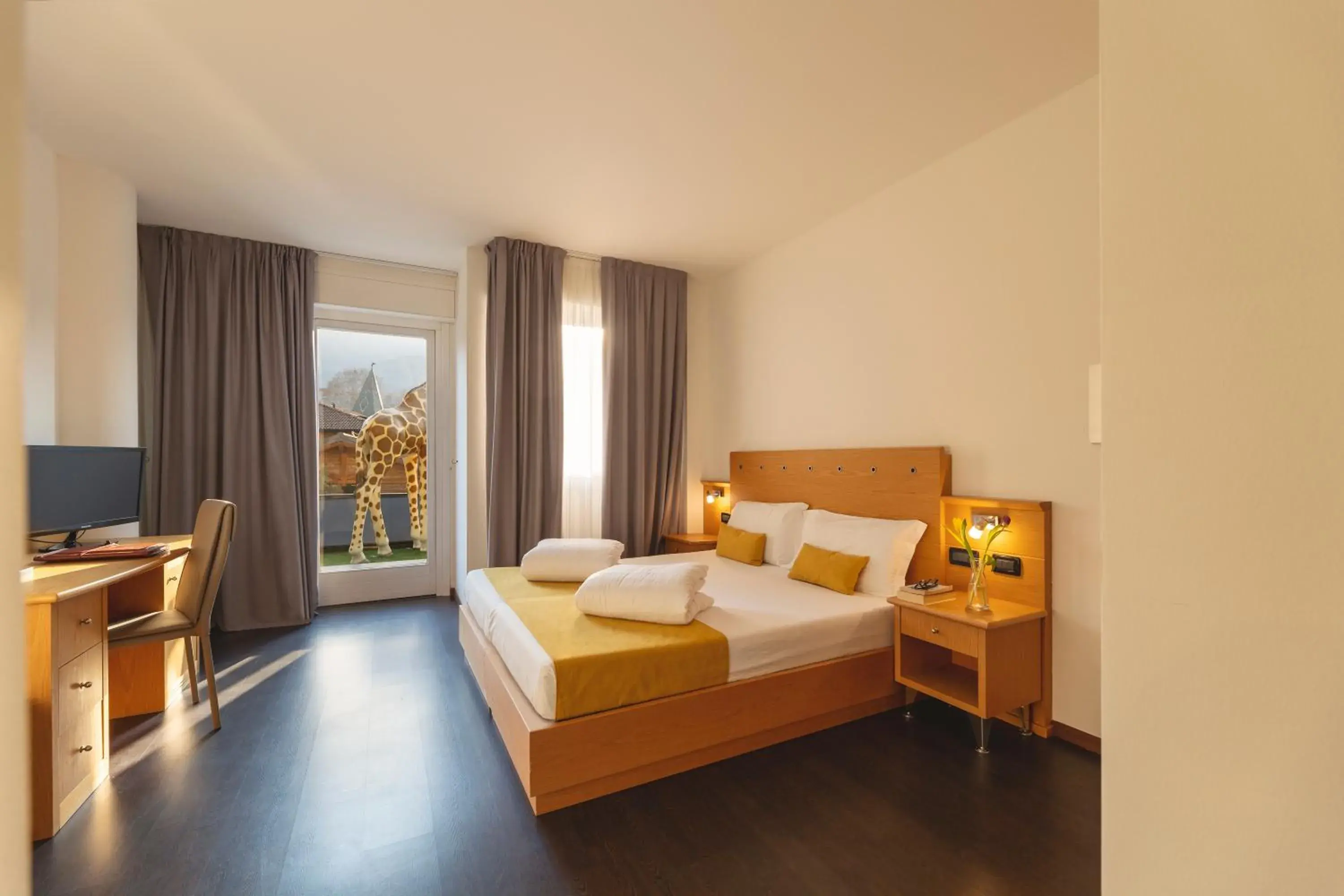 Classic Triple Room in Hi Hotels Trento - Wellness & Spa Adults Only Classic Triple Room in Hi Hotels Trento - Wellness & Spa Adults Only