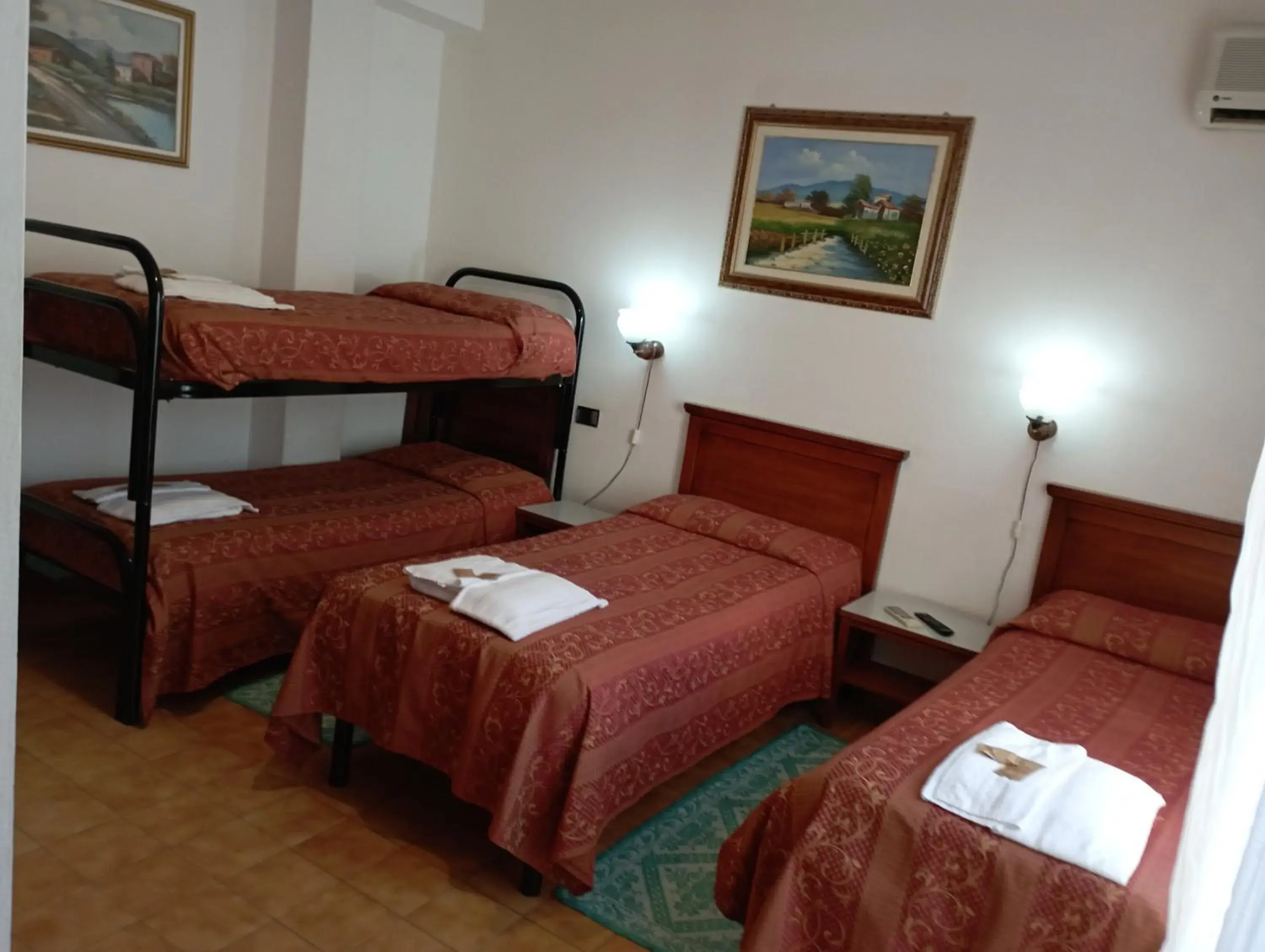 Quadruple Room with Garden View in Hotel Garden Quadruple Room with Garden View in Hotel Garden