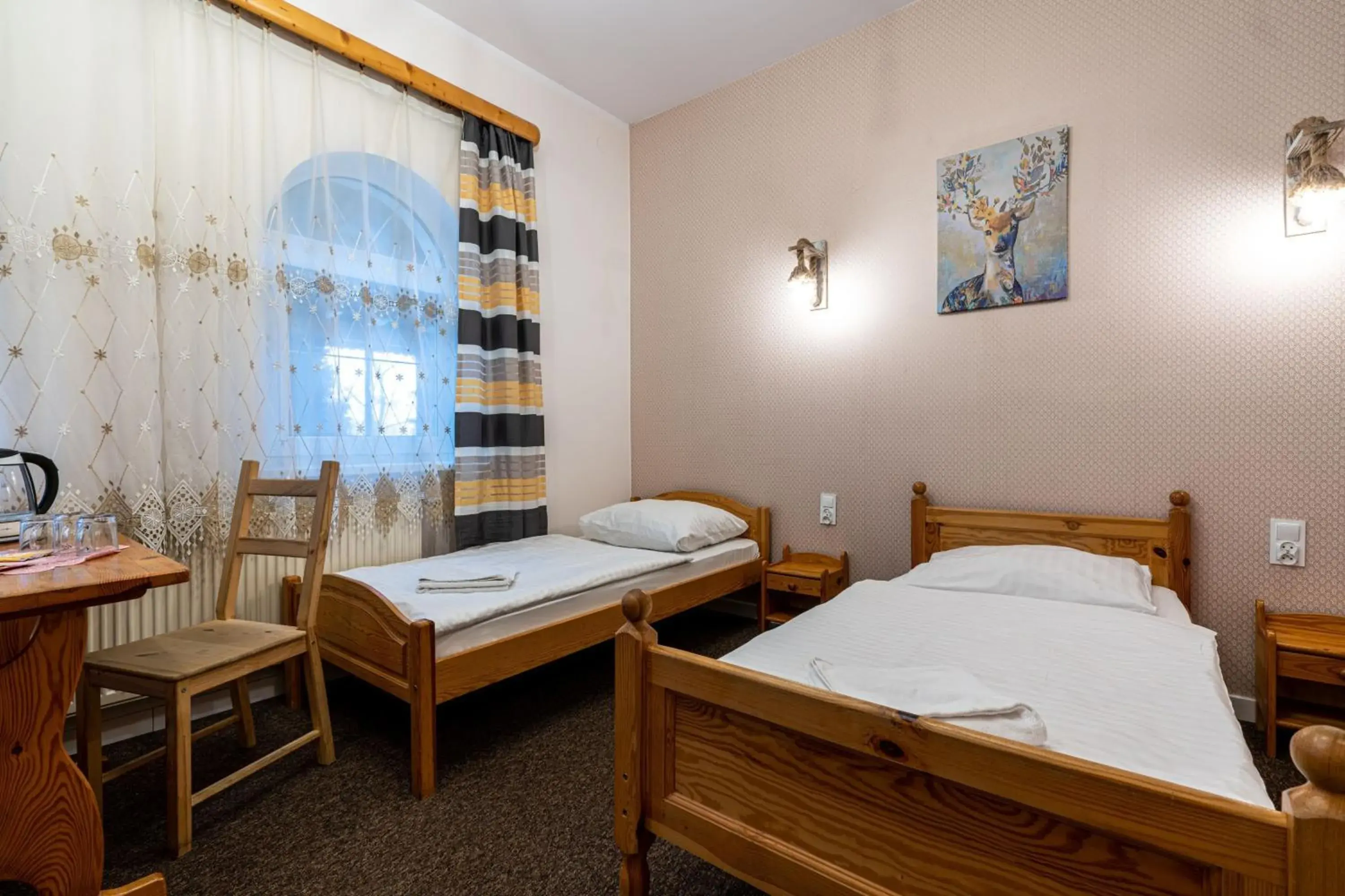 Classic Triple Room in Pensjonat Beskidzki Classic Triple Room in Pensjonat Beskidzki