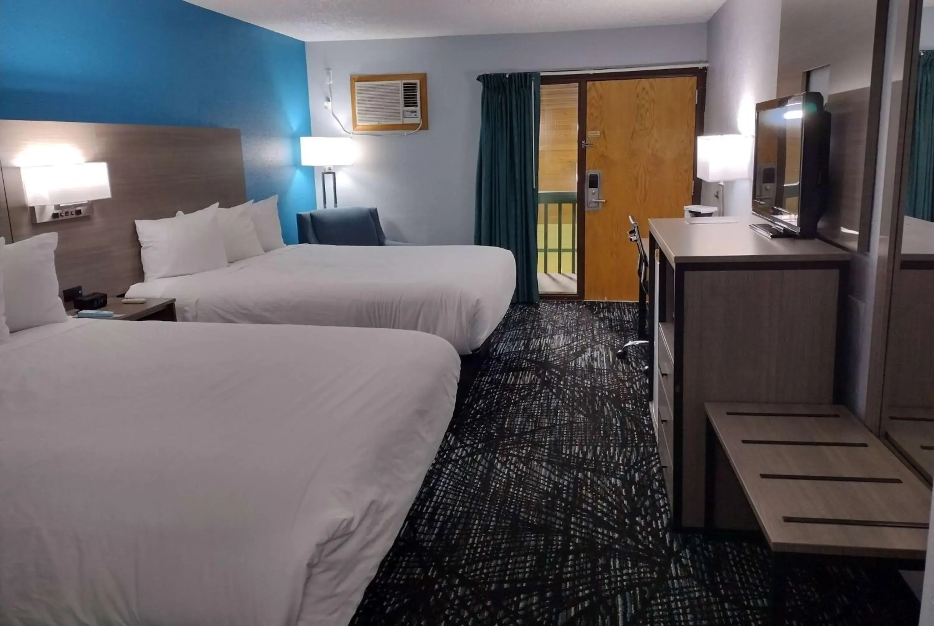 Queen Room with Two Queen Beds and Pool View - Non-Smoking in Baymont by Wyndham Proctor Queen Room with Two Queen Beds and Pool View - Non-Smoking in Baymont by Wyndham Proctor