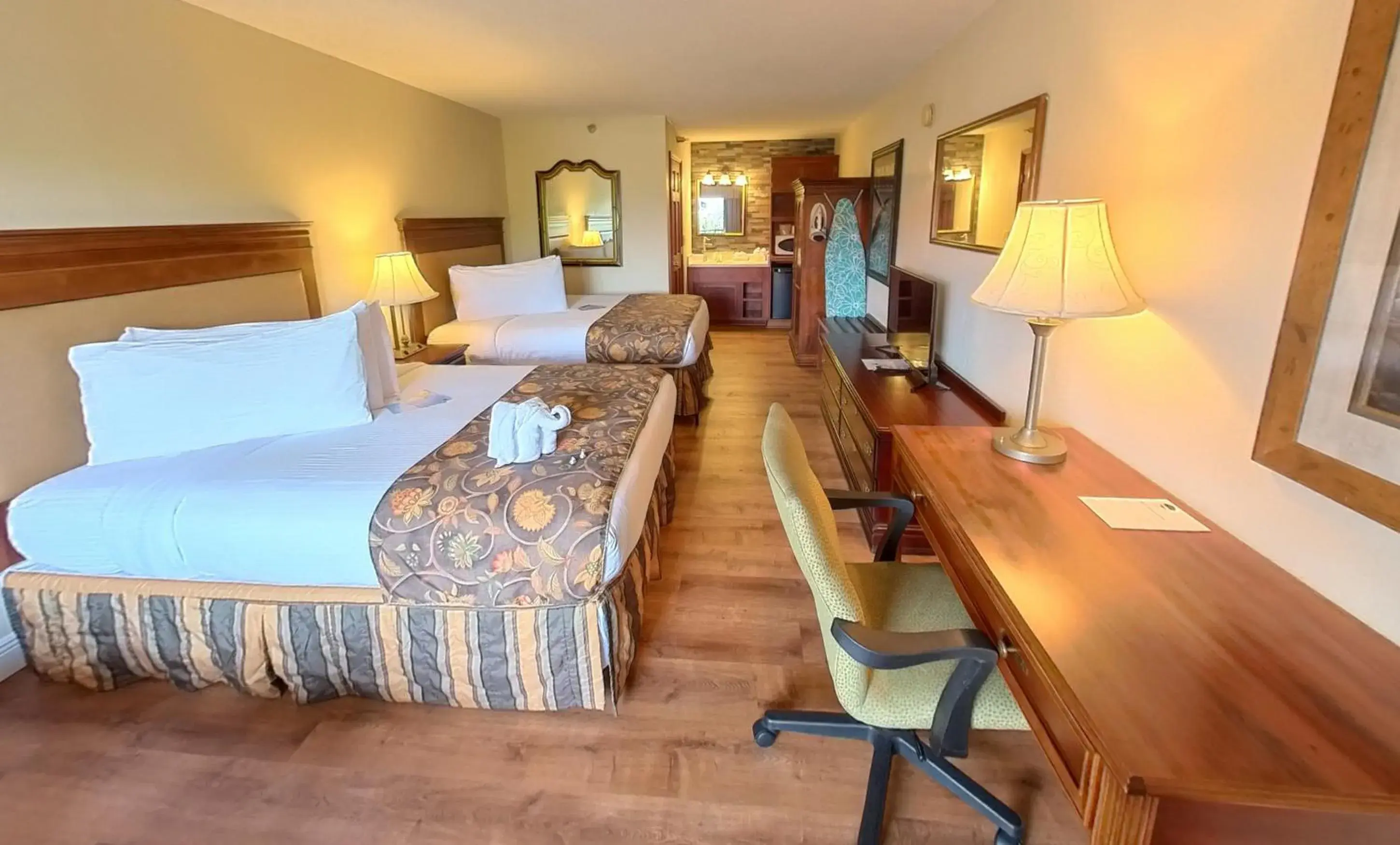 Superior Double Queen Mountain View with Shared Hall Balcony and Rocking Chairs in Arbors at Island Landing Hotel & Suites Superior Double Queen Mountain View with Shared Hall Balcony and Rocking Chairs in Arbors at Island Landing Hotel & Suites