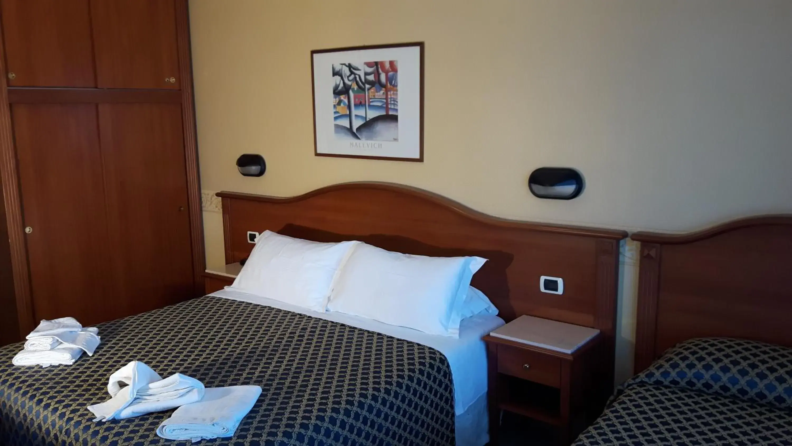 Triple Room in Hotel Grifone Triple Room in Hotel Grifone