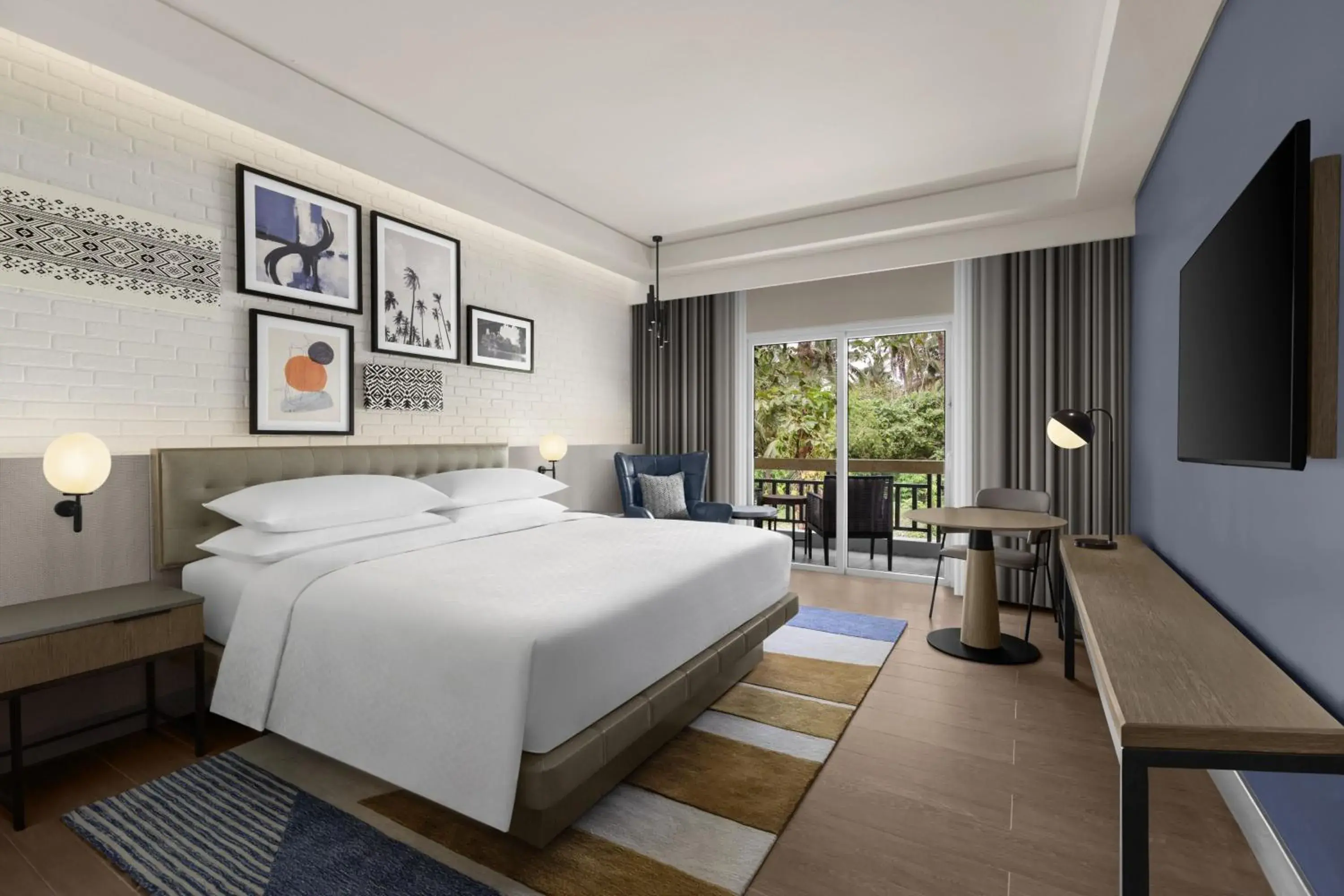 Deluxe King Room with Balcony and Garden View in Four Points by Sheraton Palawan Puerto Princesa Deluxe King Room with Balcony and Garden View in Four Points by Sheraton Palawan Puerto Princesa