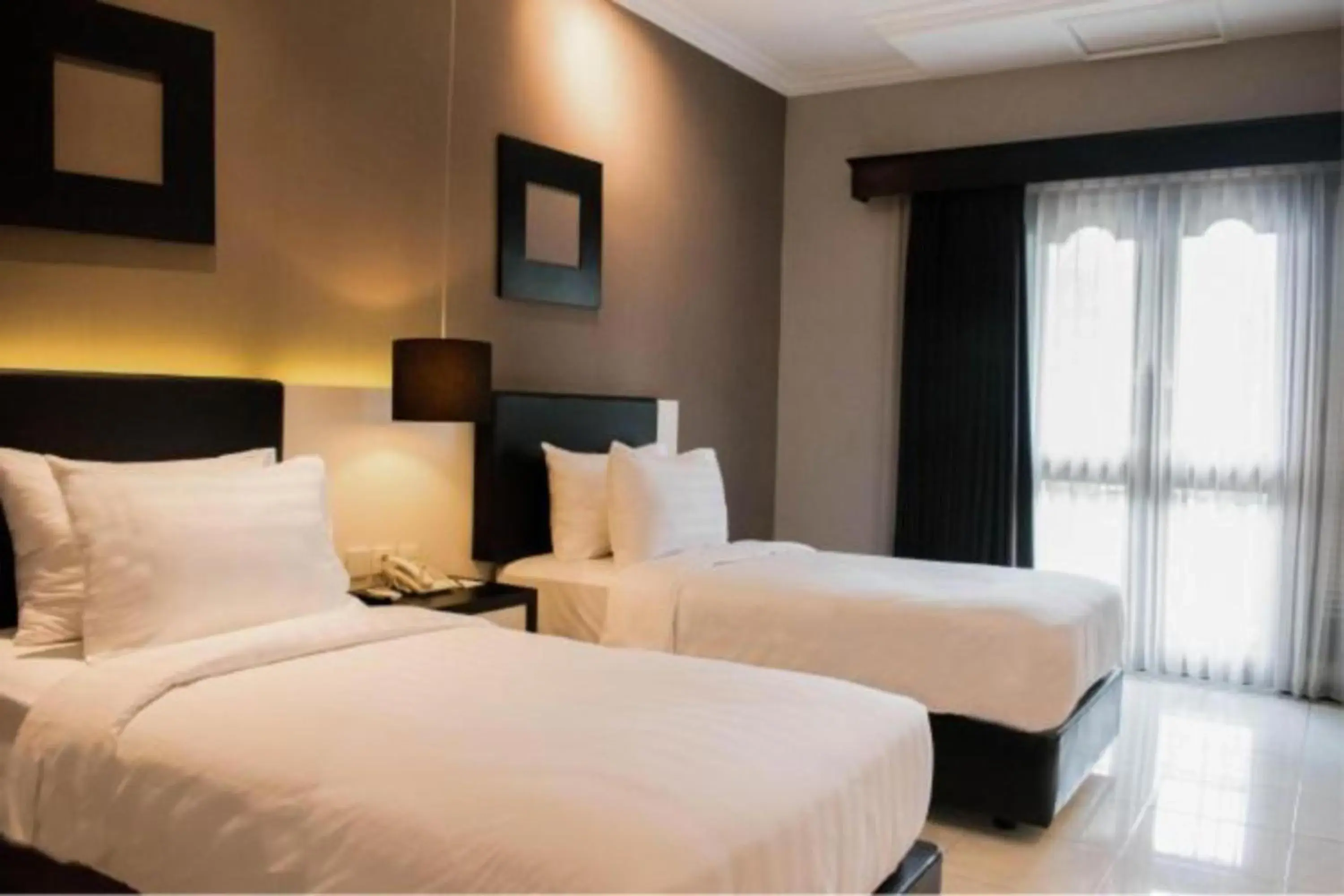 Deluxe Double or Twin Room in Luminor Hotel Jember By WH Deluxe Double or Twin Room in Luminor Hotel Jember By WH