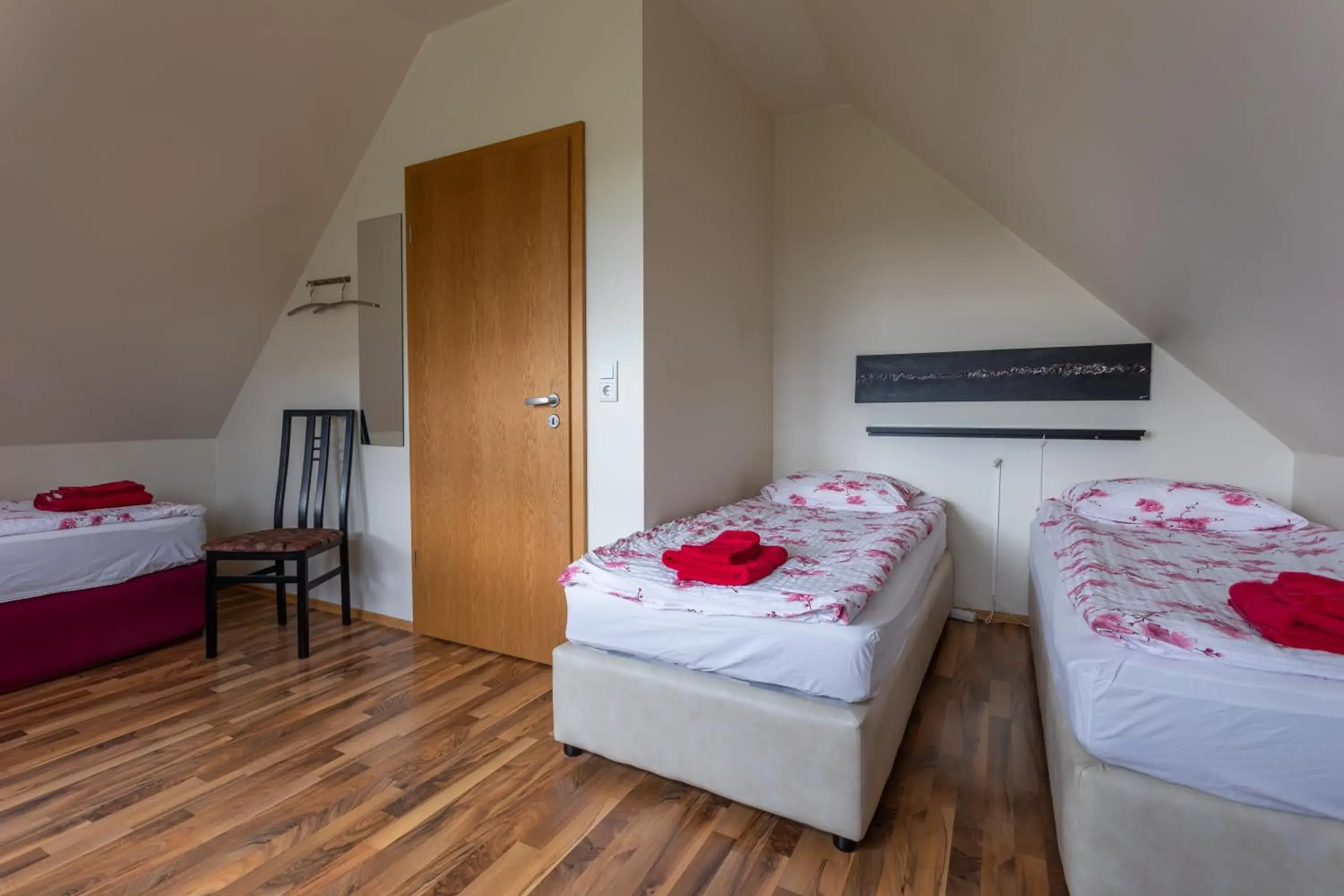 Triple Room with Shared Bathroom in Guesthouse Dalbaer Triple Room with Shared Bathroom in Guesthouse Dalbaer