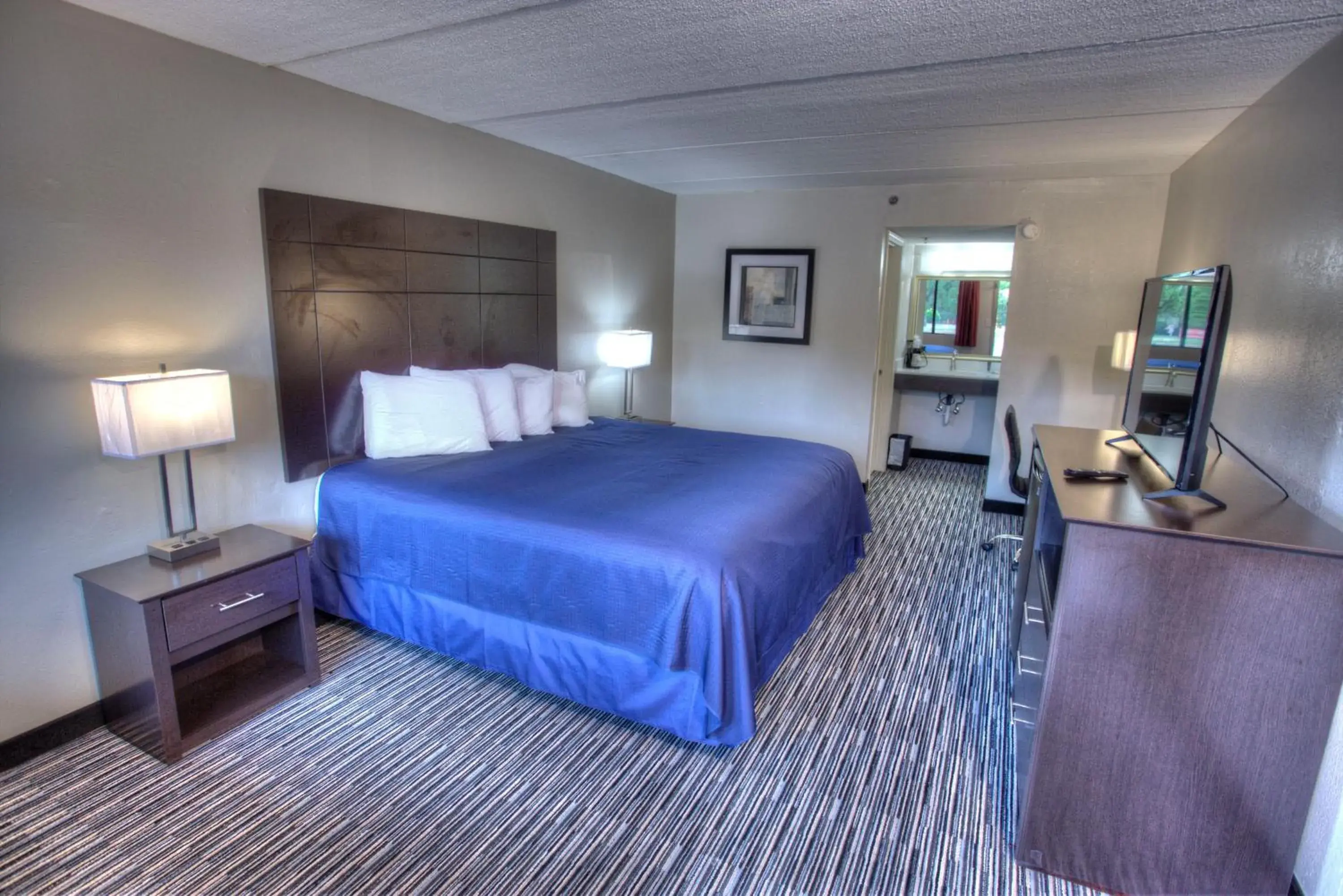 Photo of the whole room, Bed in Budgetel Inn and Suites Plus Photo of the whole room, Bed in Budgetel Inn and Suites Plus