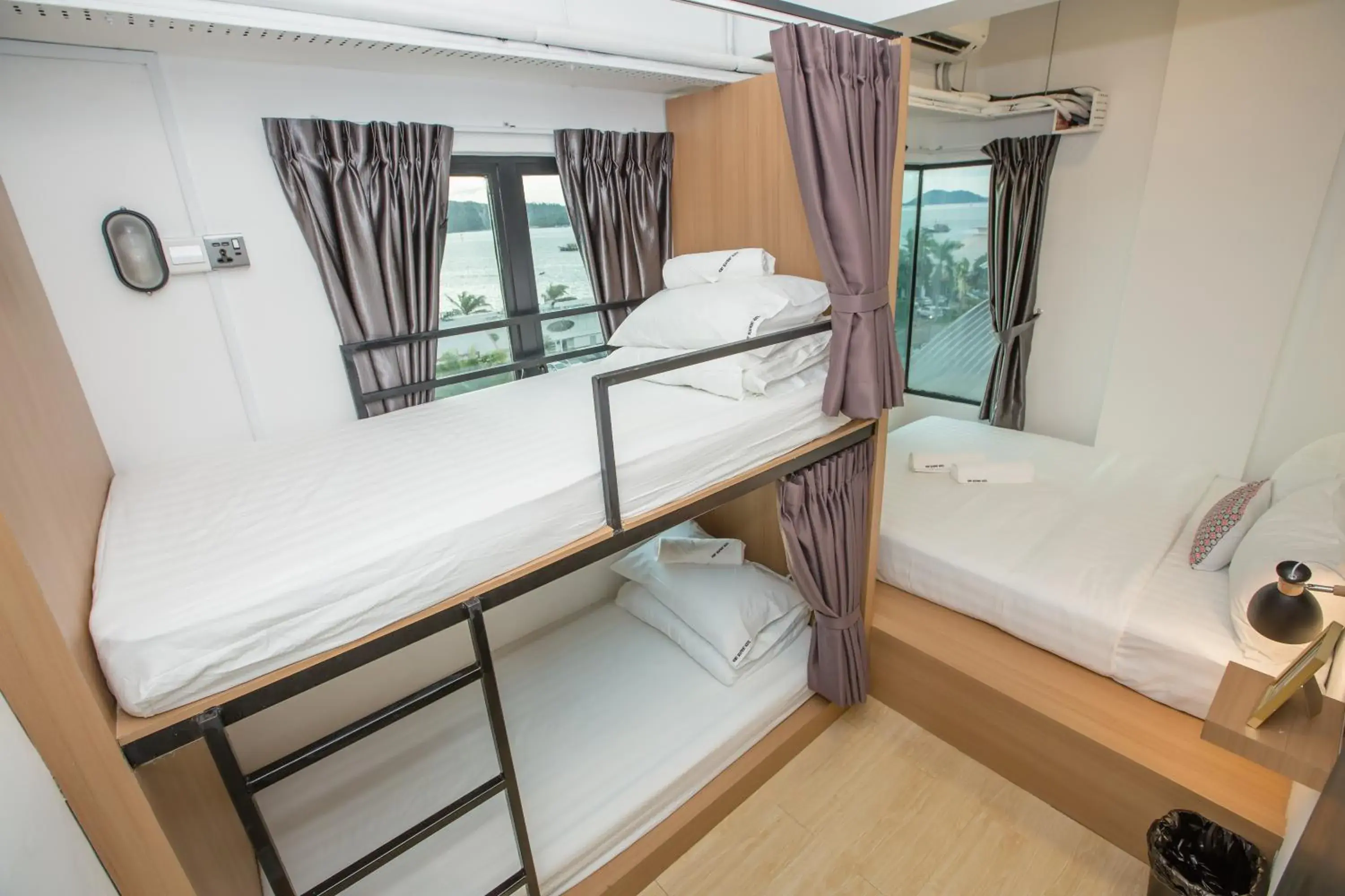 Family Room with Sea View in Homy Seafront Hostel Family Room with Sea View in Homy Seafront Hostel