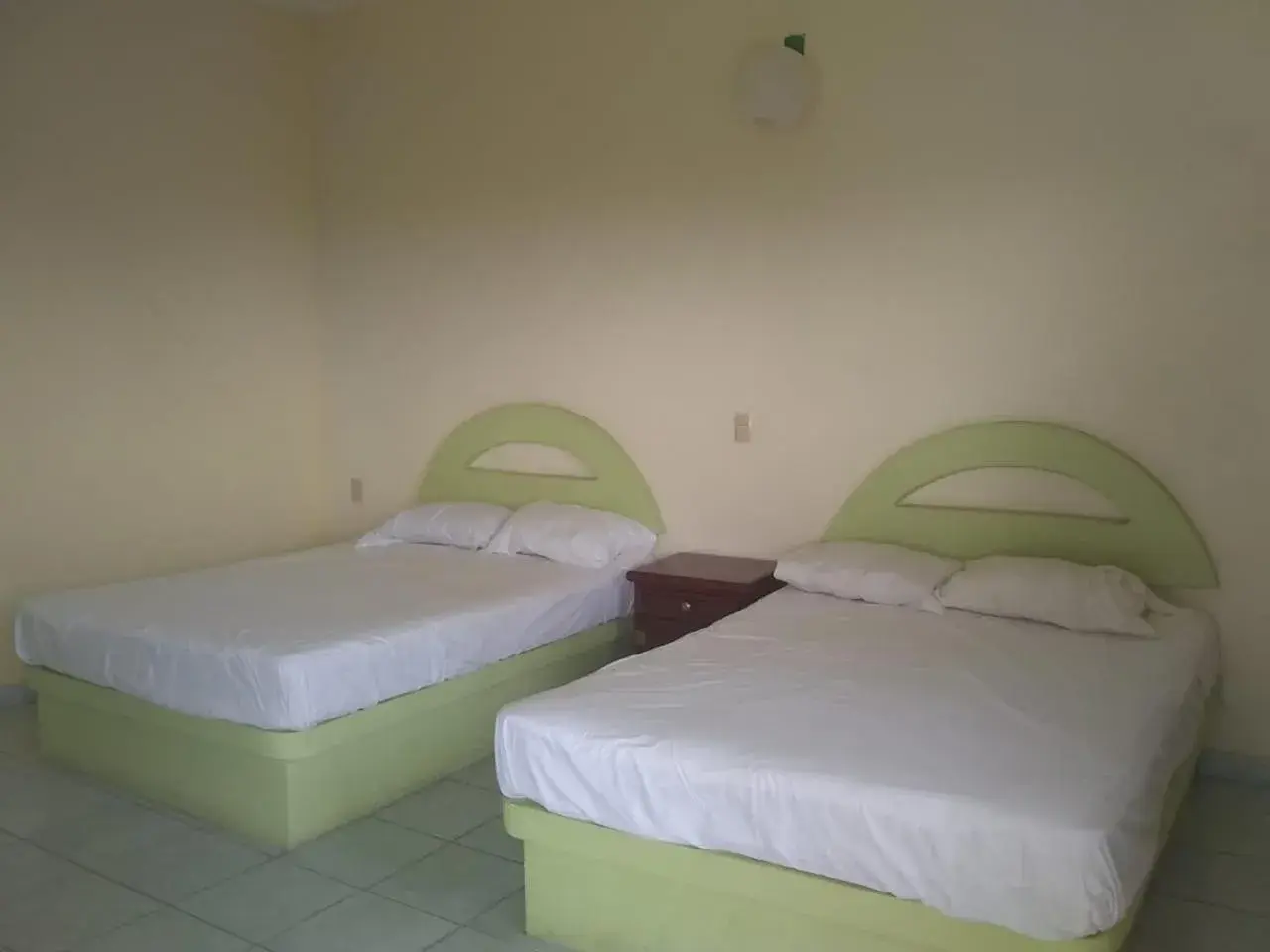 Economy Quadruple Room in Hotel Azulejos Economy Quadruple Room in Hotel Azulejos