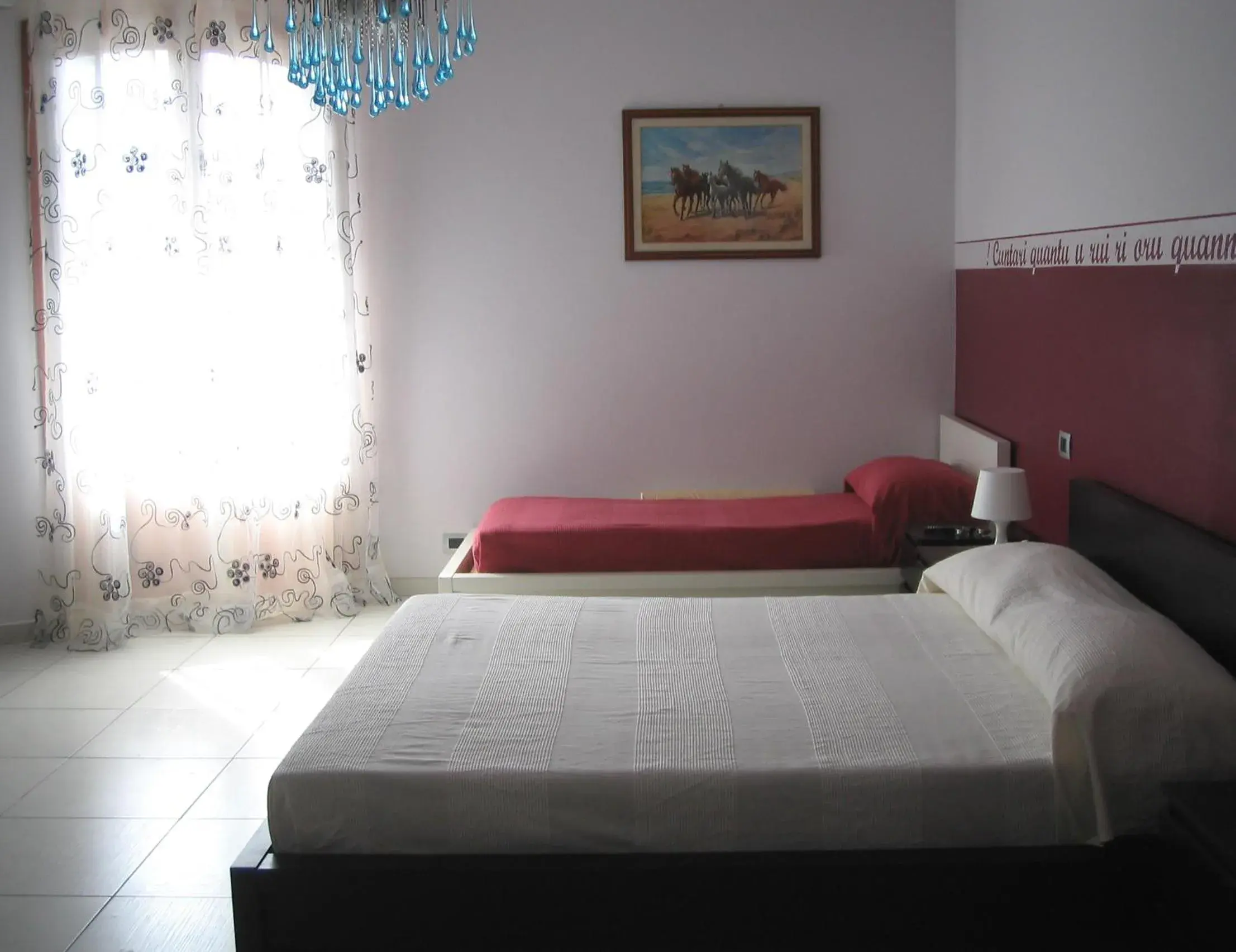 Quadruple Room with Balcony in B&B Persi Nel Sud, Pozzallo Quadruple Room with Balcony in B&B Persi Nel Sud, Pozzallo