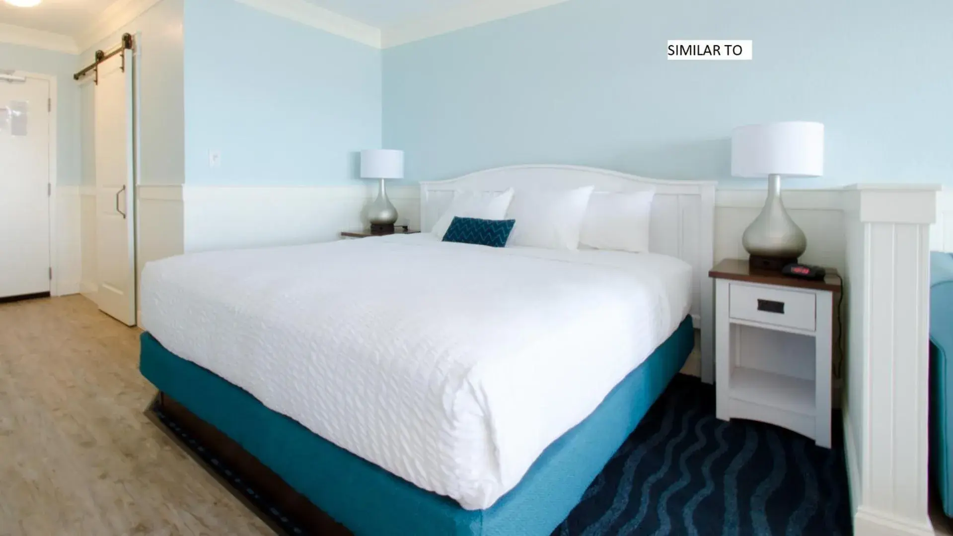 Deluxe - 1 King Bed Side View - 4 Seasons - No Pets in John Yancey Oceanfront Inn Deluxe - 1 King Bed Side View - 4 Seasons - No Pets in John Yancey Oceanfront Inn