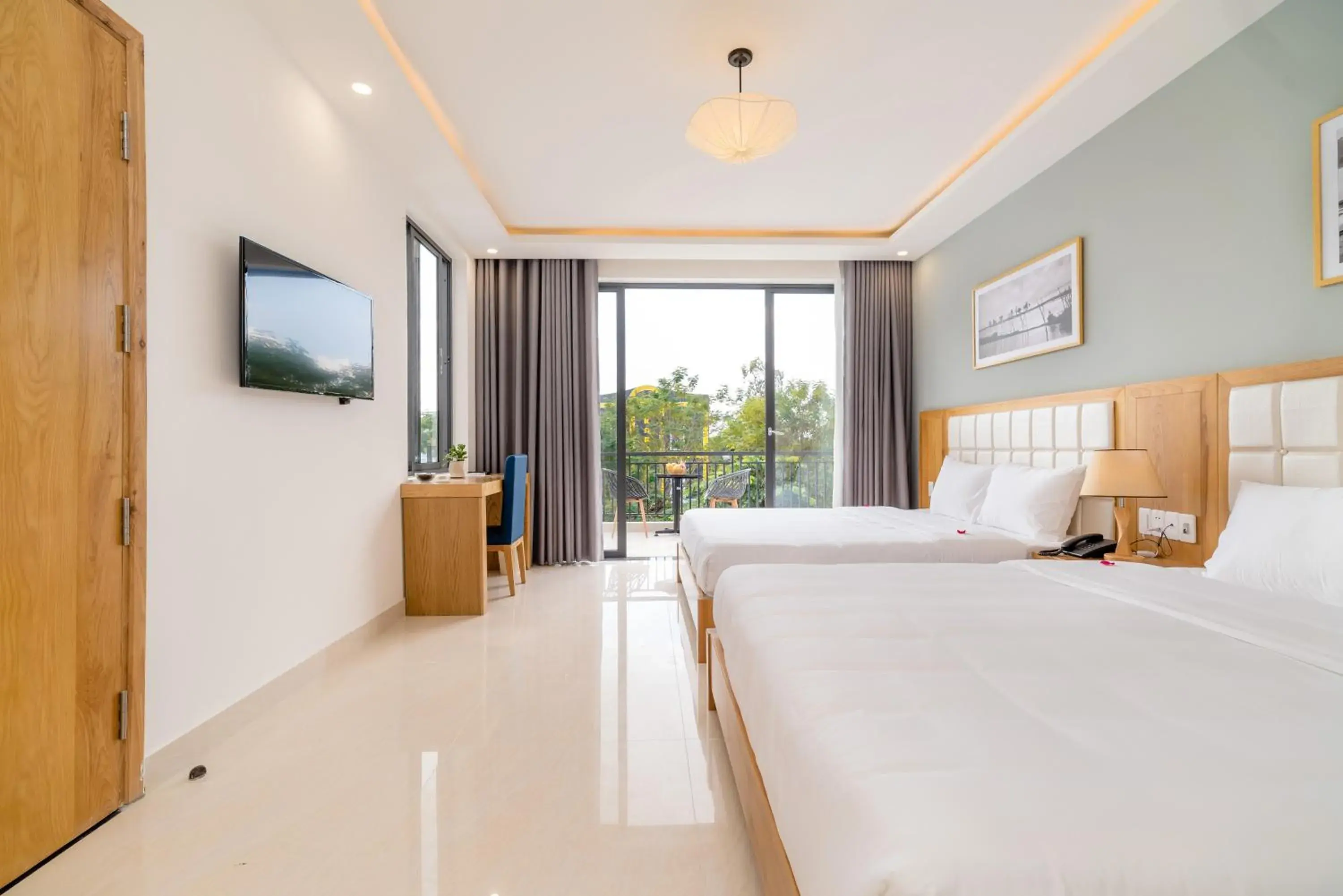 Family Room with Balcony in Babylon Hoi An Central Villa Family Room with Balcony in Babylon Hoi An Central Villa