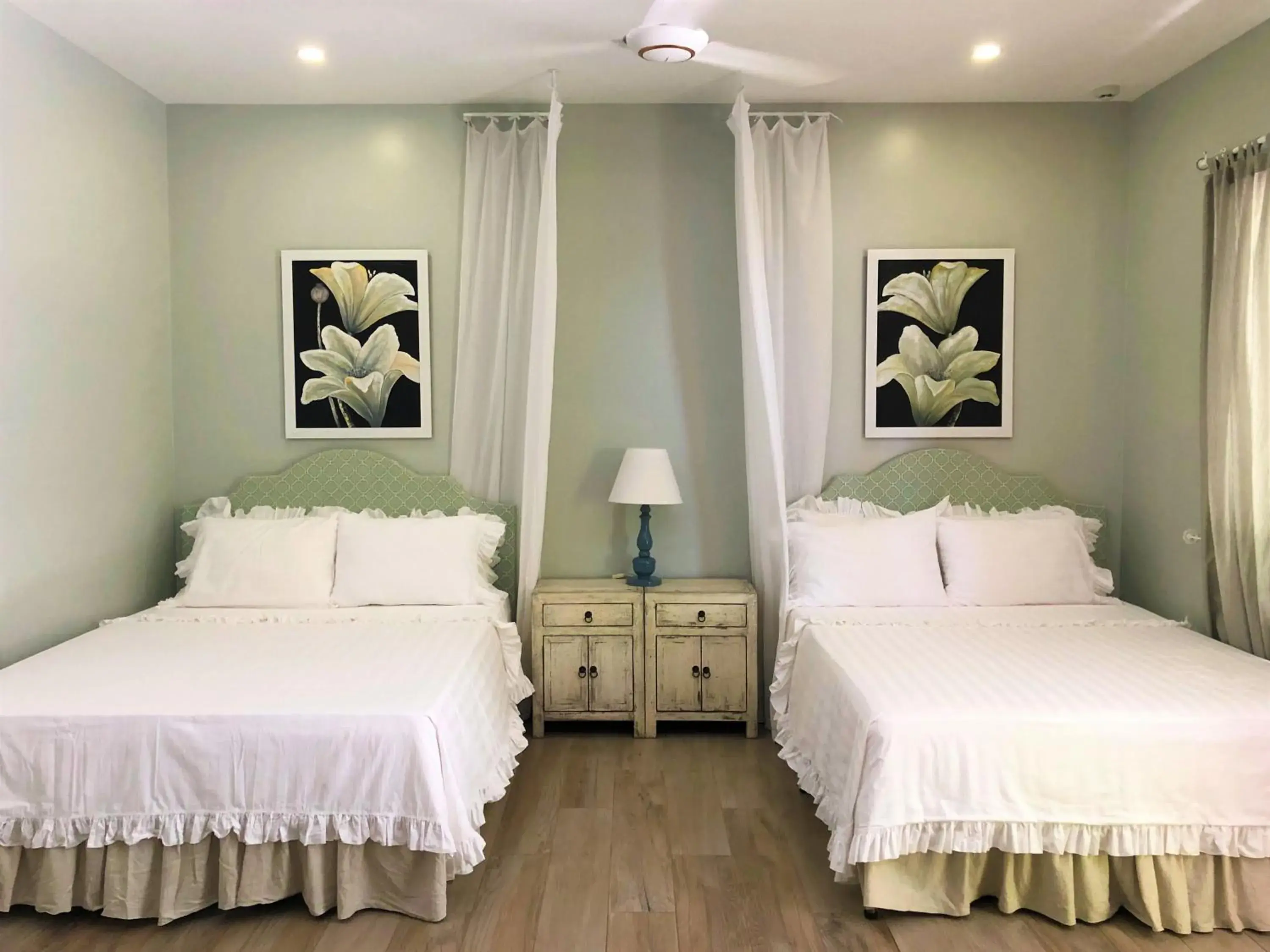 Quadruple Room with Garden View in Serenity by the Sea Quadruple Room with Garden View in Serenity by the Sea