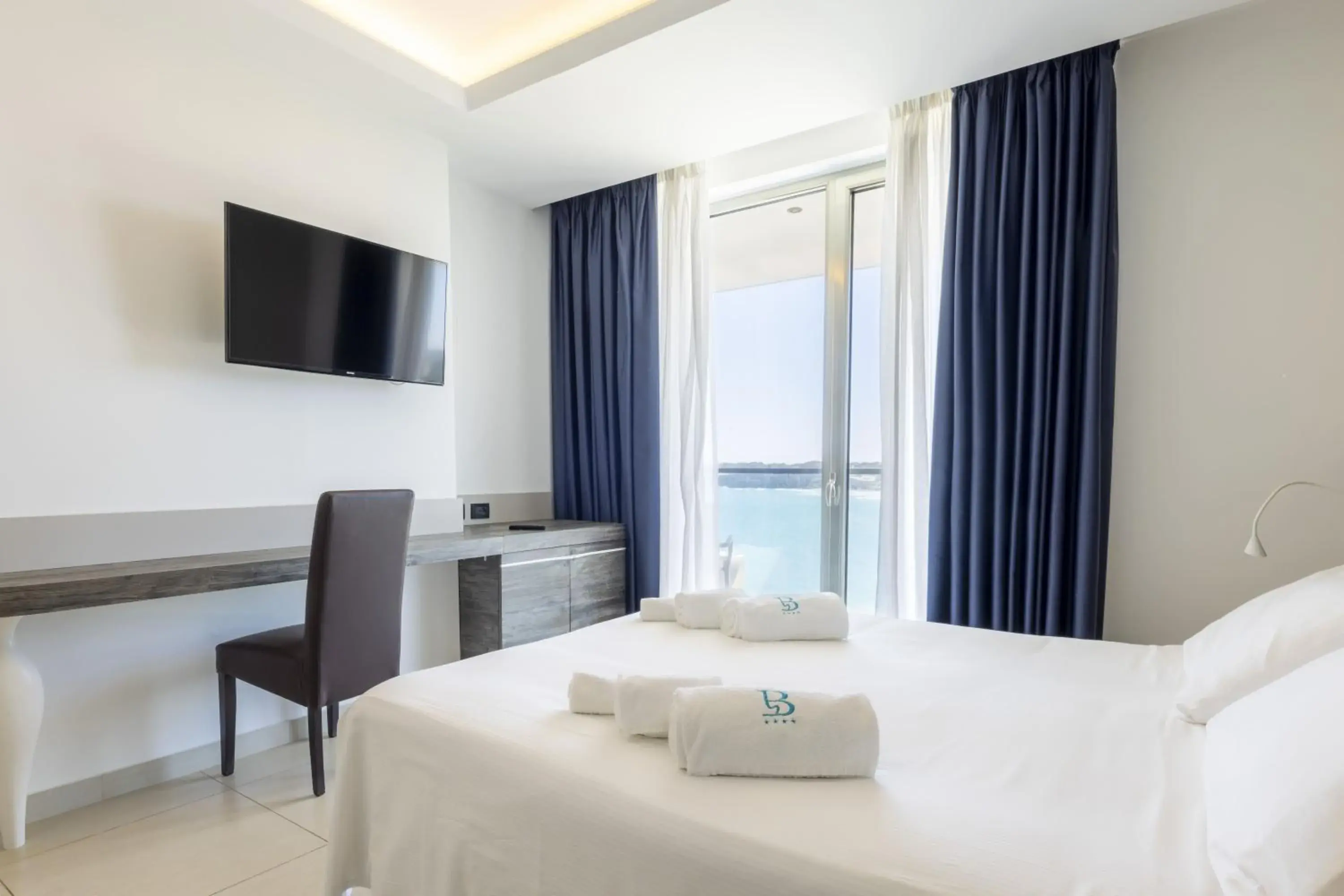 Deluxe Family Room (2 Adults + 2 Children) in Hotel Belvedere Deluxe Family Room (2 Adults + 2 Children) in Hotel Belvedere