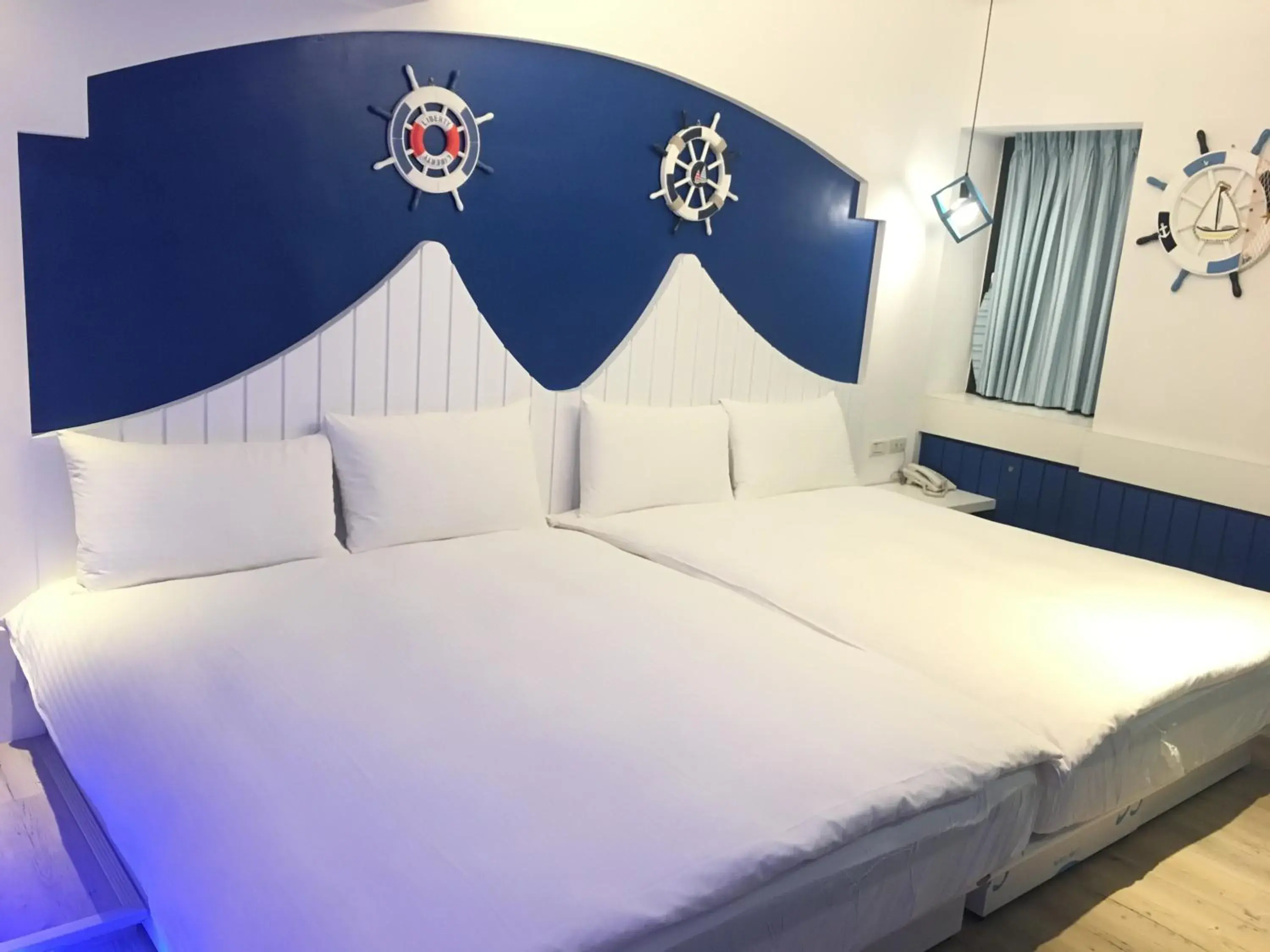 Quadruple Room with Private Bathroom in Haozhan Hotel Quadruple Room with Private Bathroom in Haozhan Hotel