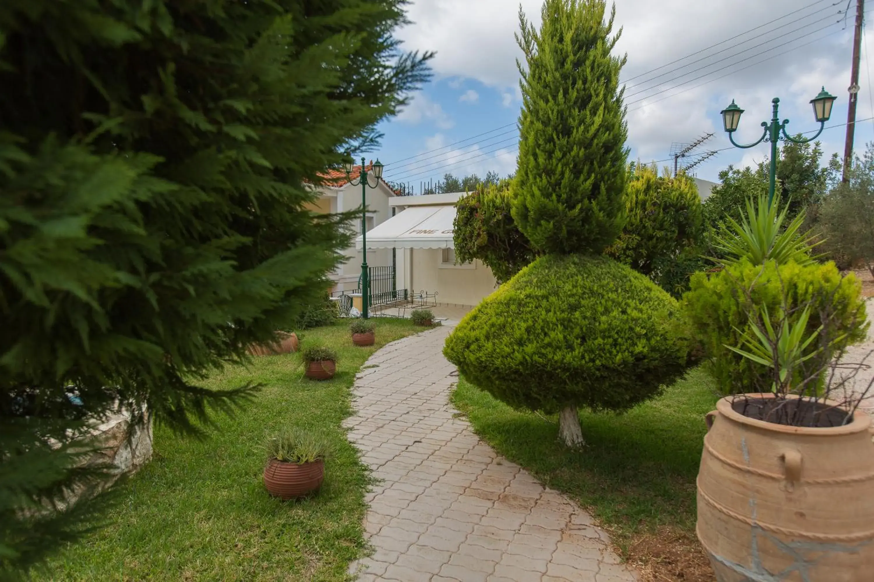 One-Bedroom Apartment with Garden View (2 Adults + 2 Children) in Garbis Villas & Apartments One-Bedroom Apartment with Garden View (2 Adults + 2 Children) in Garbis Villas & Apartments