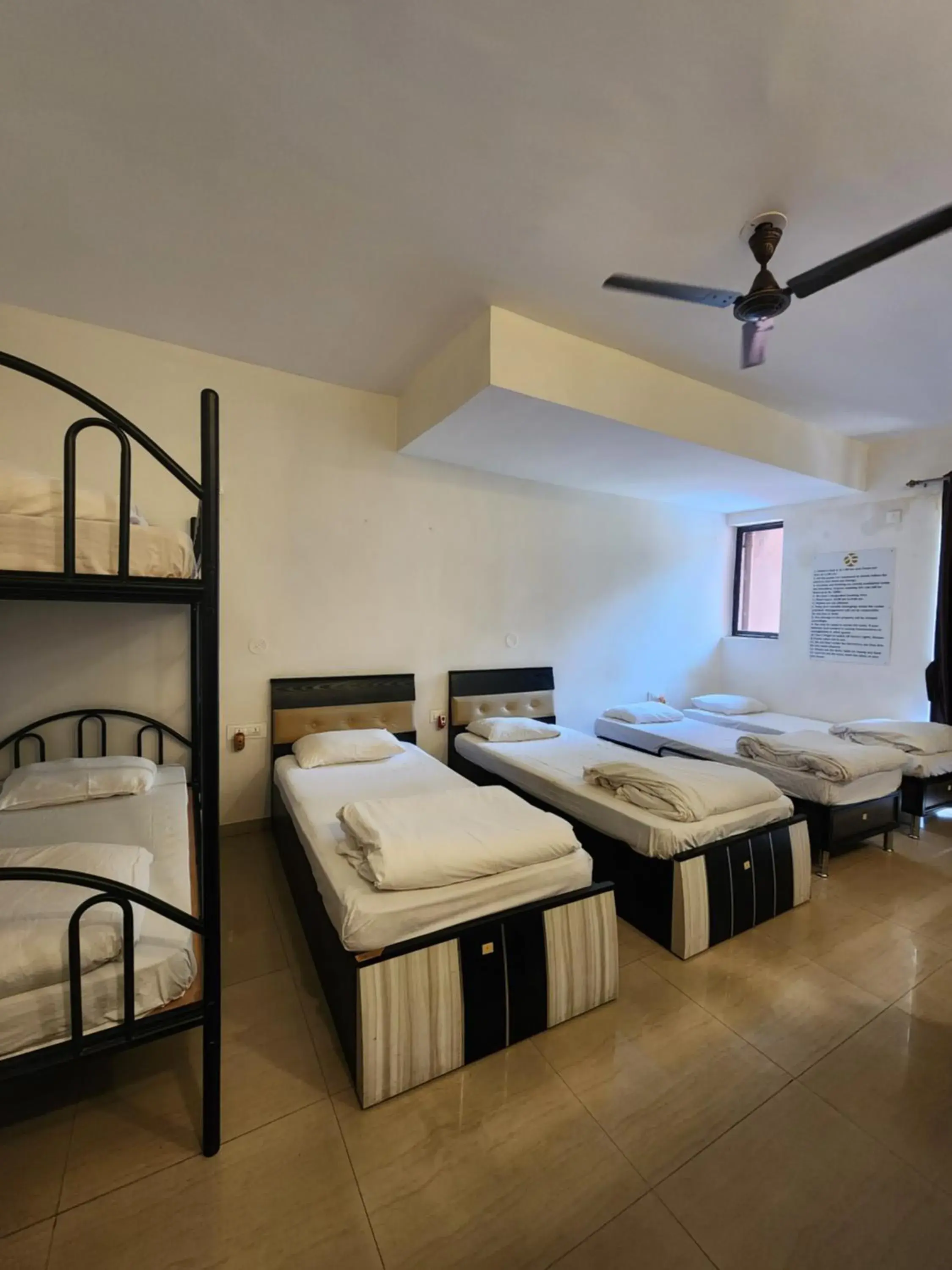 Bed in Male Dormitory Room in All Seasons Guest House I Rooms & Dorms Bed in Male Dormitory Room in All Seasons Guest House I Rooms & Dorms