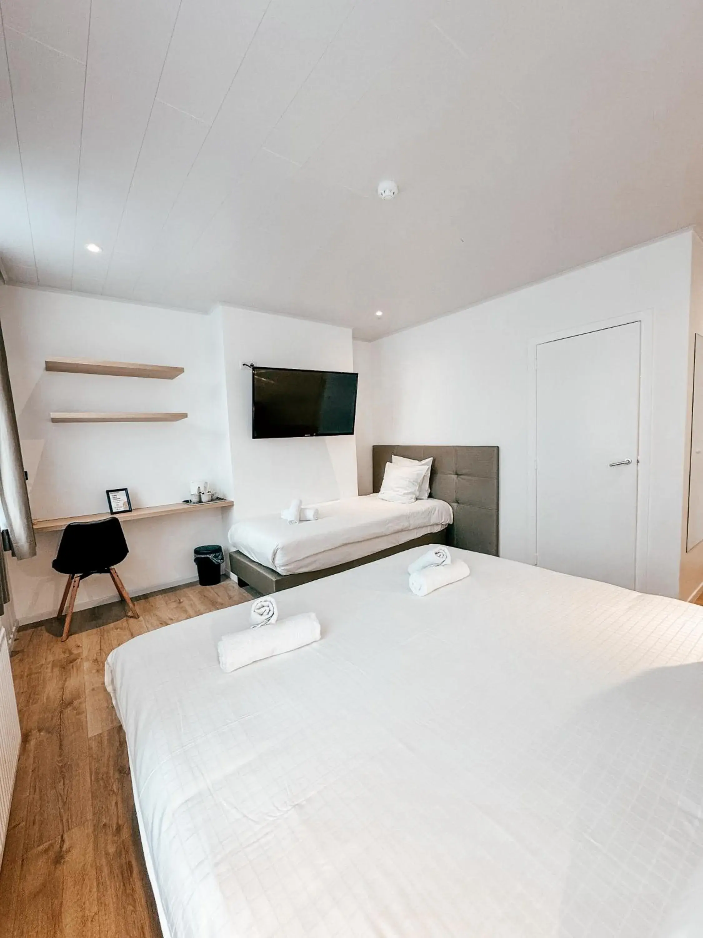 Standard Triple Room in Alpha Hotel Standard Triple Room in Alpha Hotel