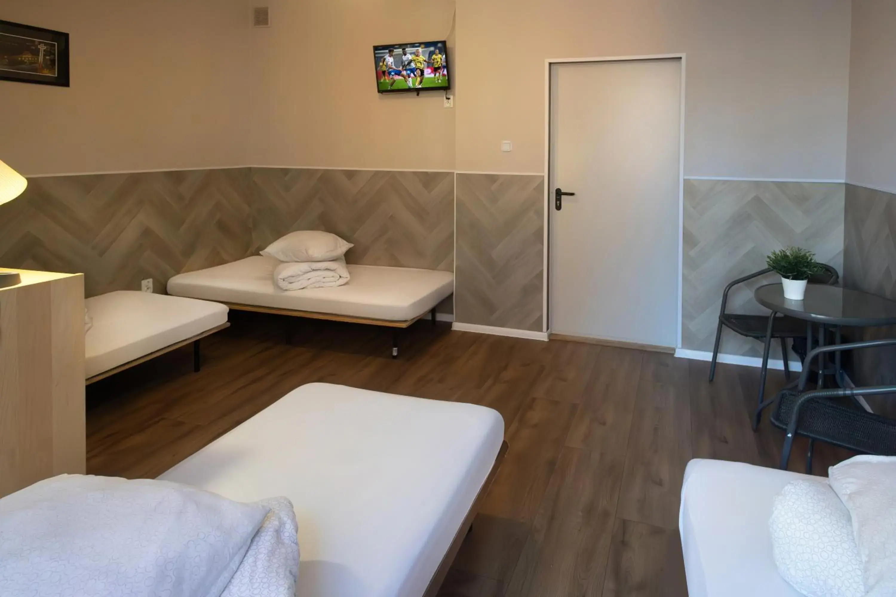 Quadruple Room - single occupancy in Hostel Kamienica Rynek 7 Quadruple Room - single occupancy in Hostel Kamienica Rynek 7