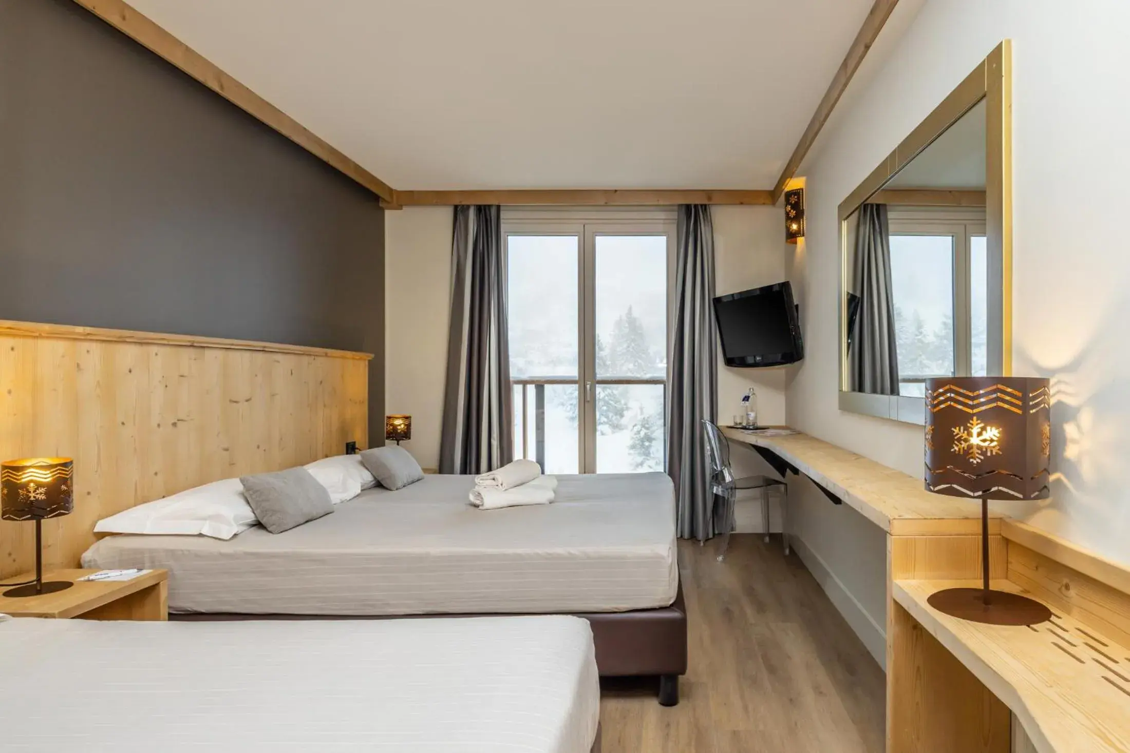 Triple Room in Hotel Piandineve Triple Room in Hotel Piandineve