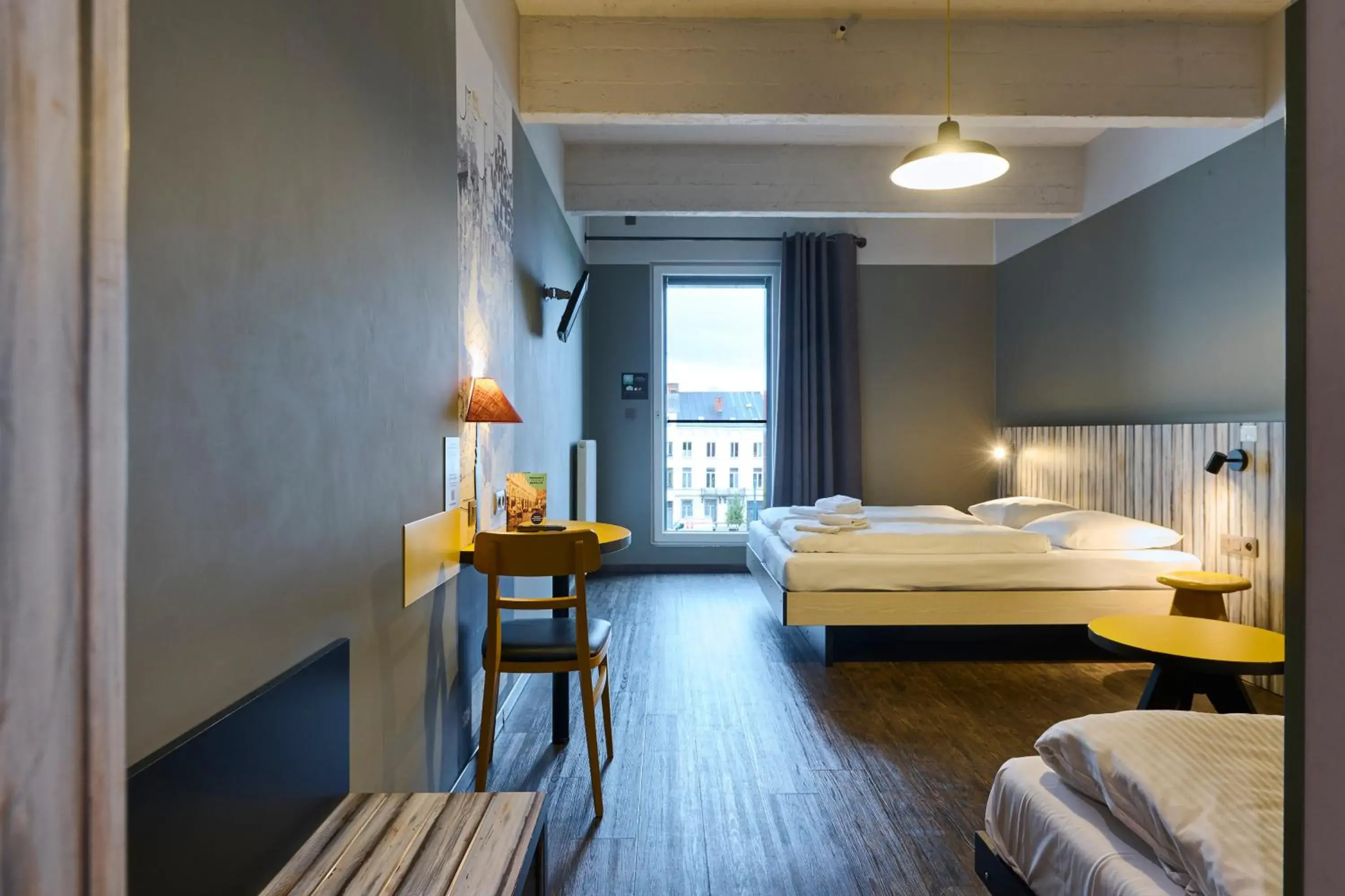 Triple Room in MEININGER Hotels Bruxelles City Center Triple Room in MEININGER Hotels Bruxelles City Center